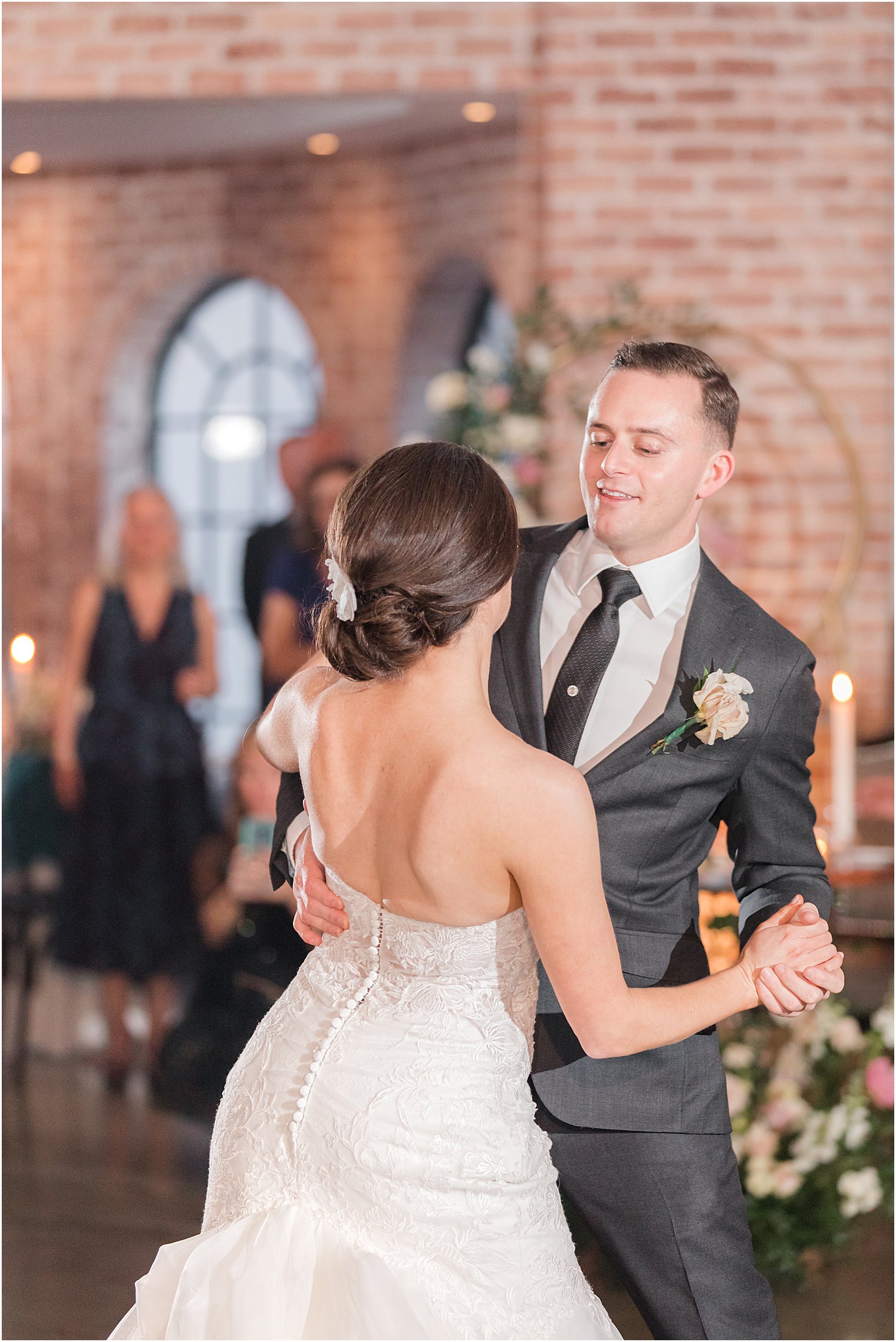 bride and groom's first dance at The Refinery at Perona Farms