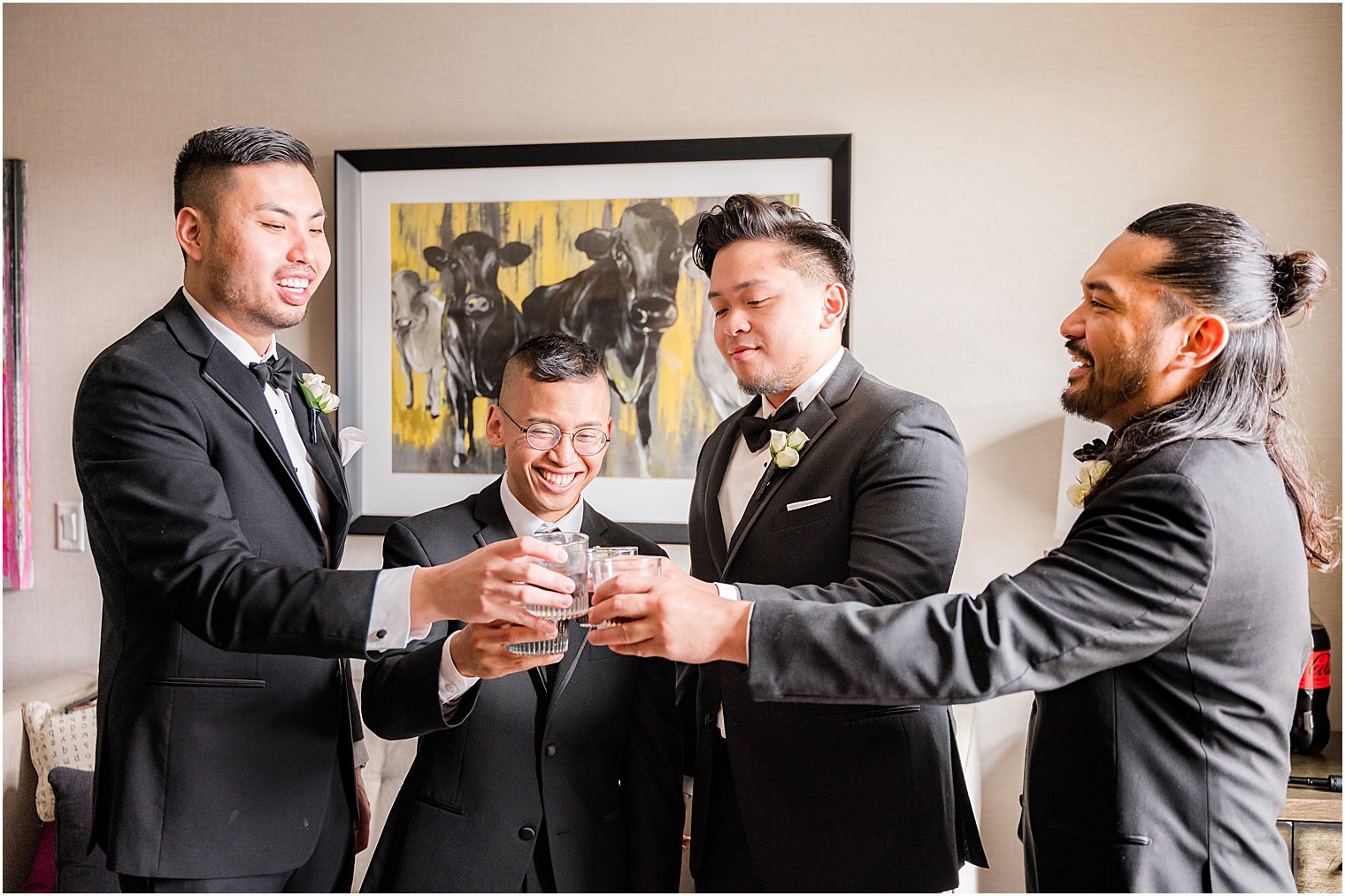 groom and groomsmen have toast during prep for The Lodge at Stirling Ridge wedding