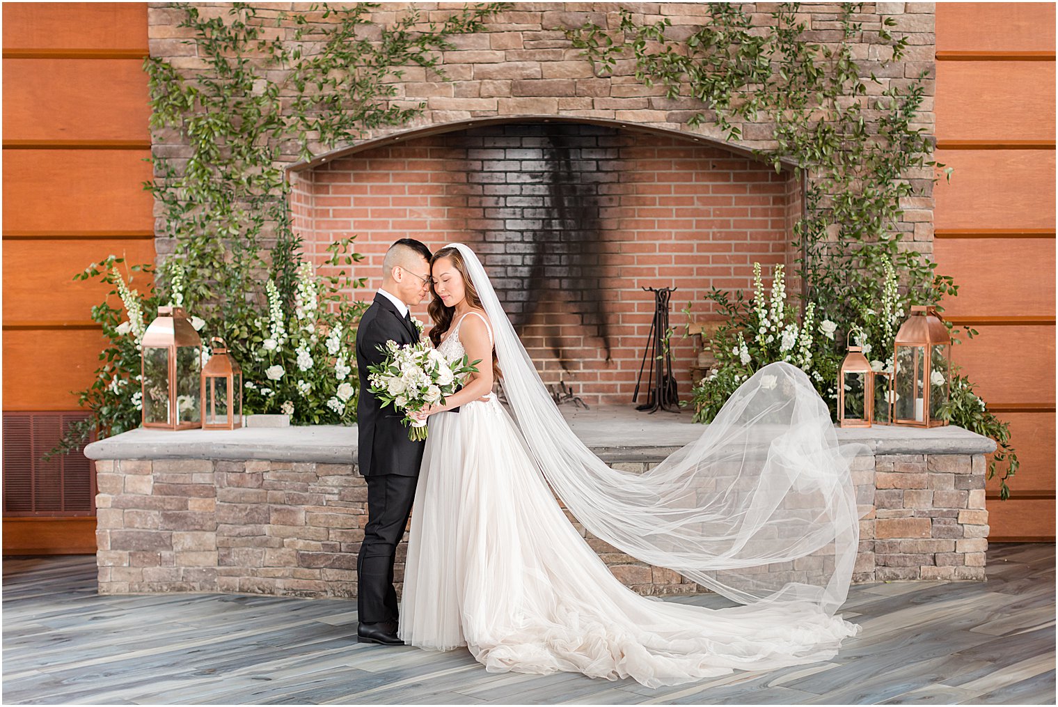 couple leans together during NJ wedding portraits