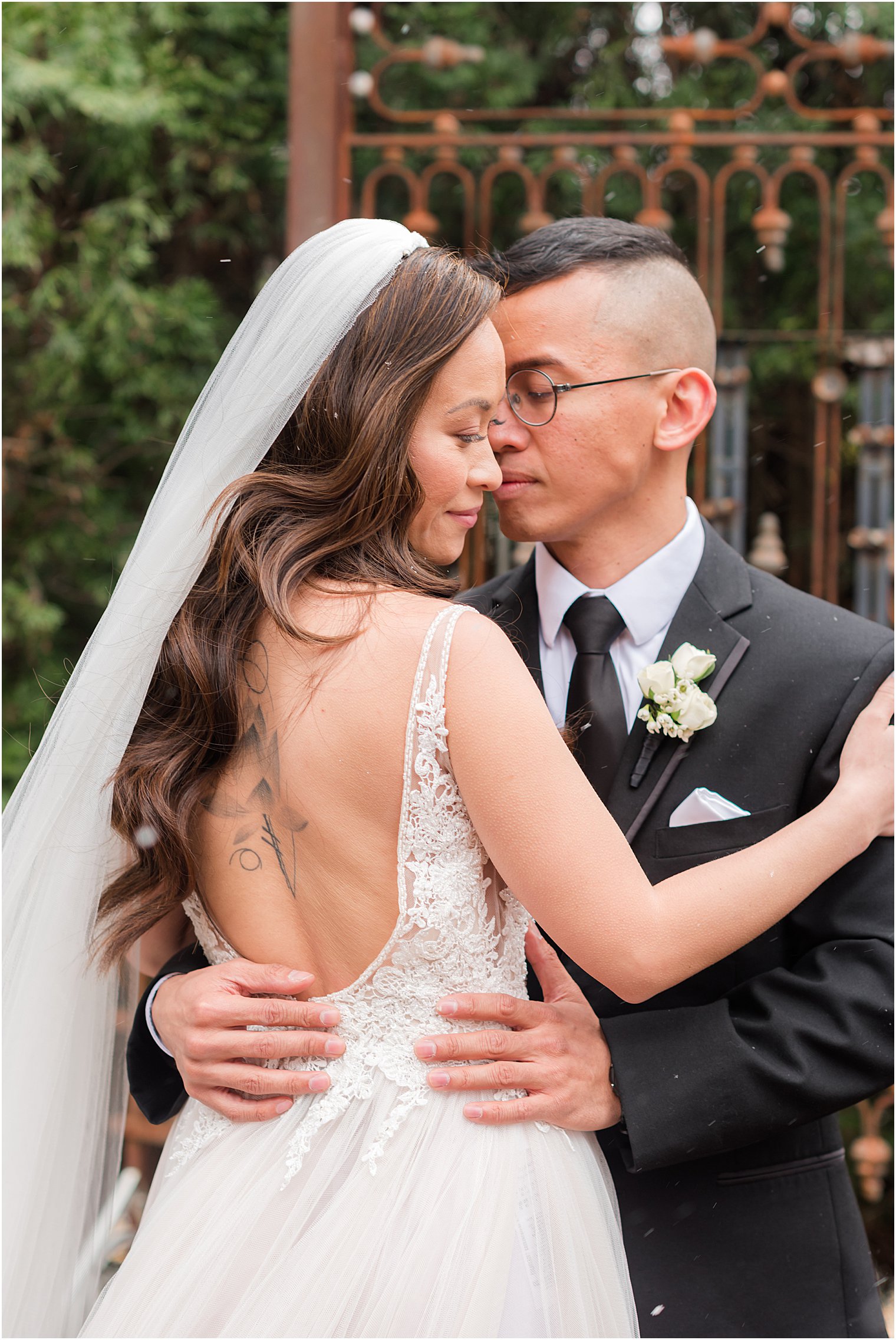 bride and groom hug during portraits at The Lodge at Stirling Ridge