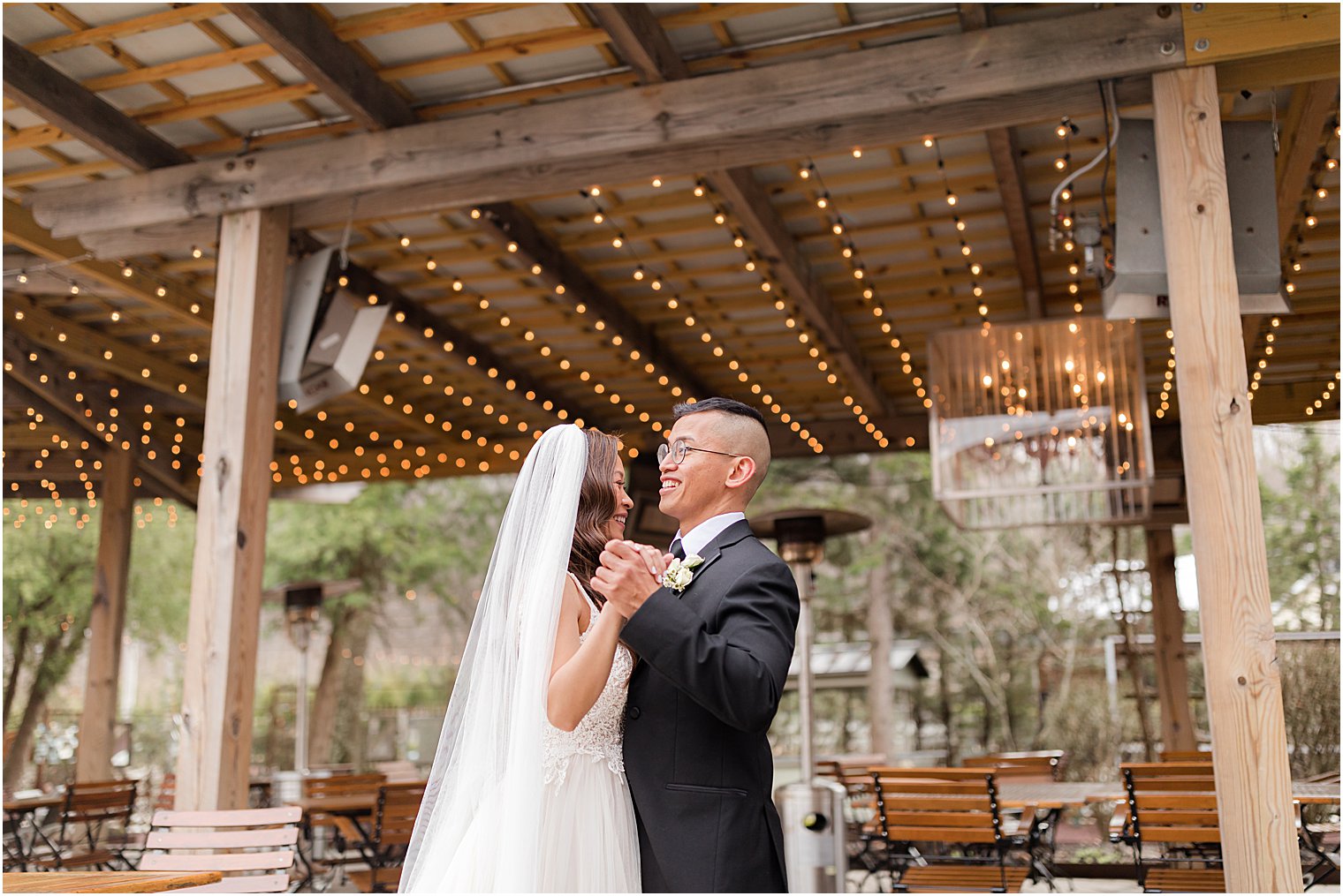 couple dances on patio at The Lodge at Stirling Ridge