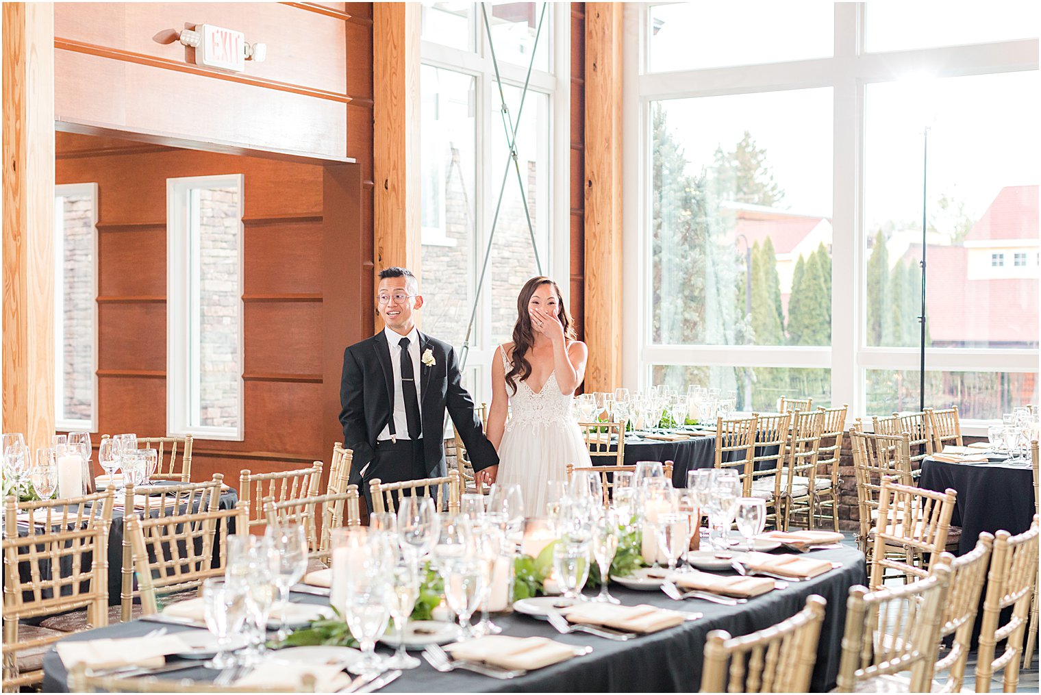 bride gasps when she sees wedding reception setup