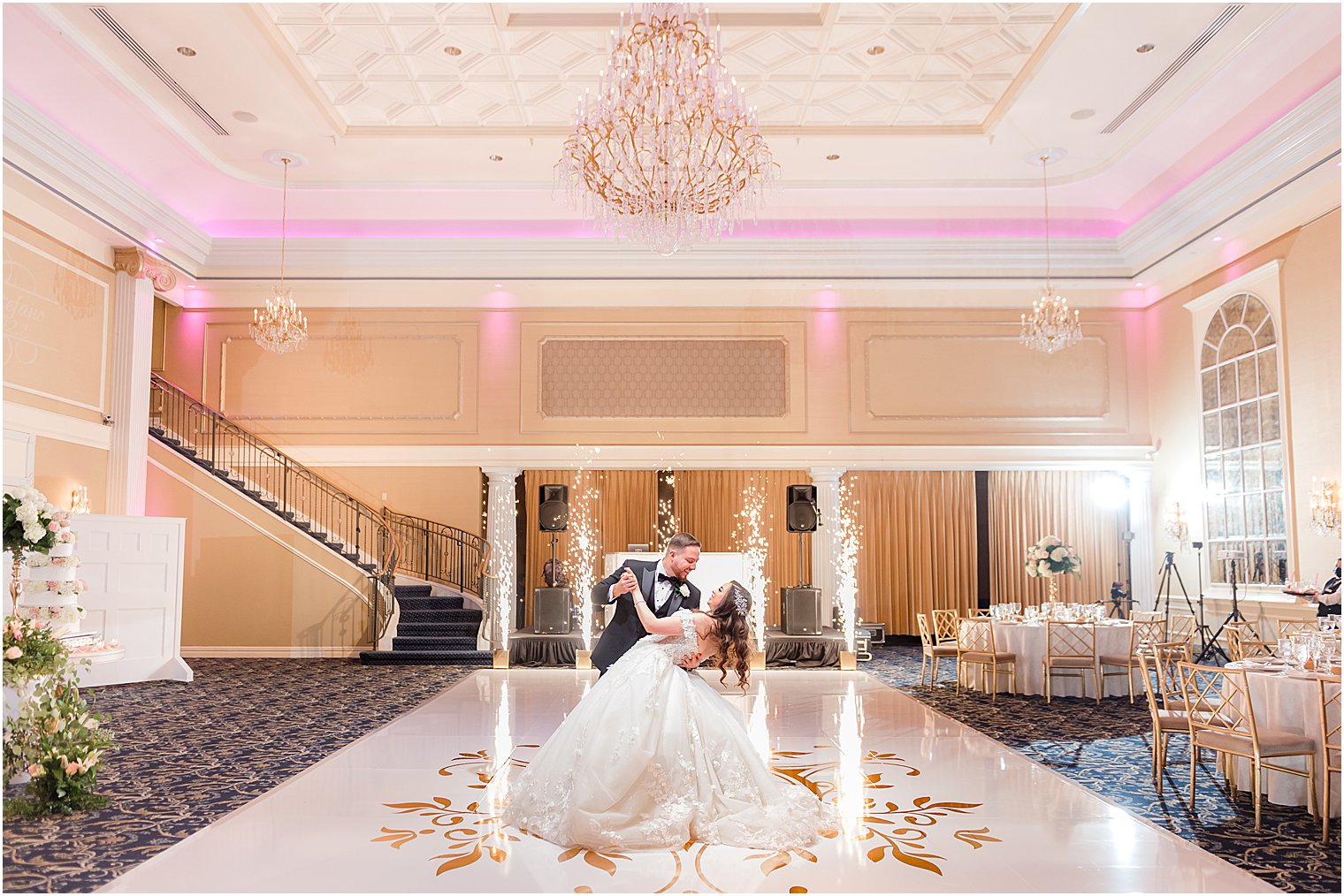 groom dips bride on dance floor at The Palace at Somerset Park