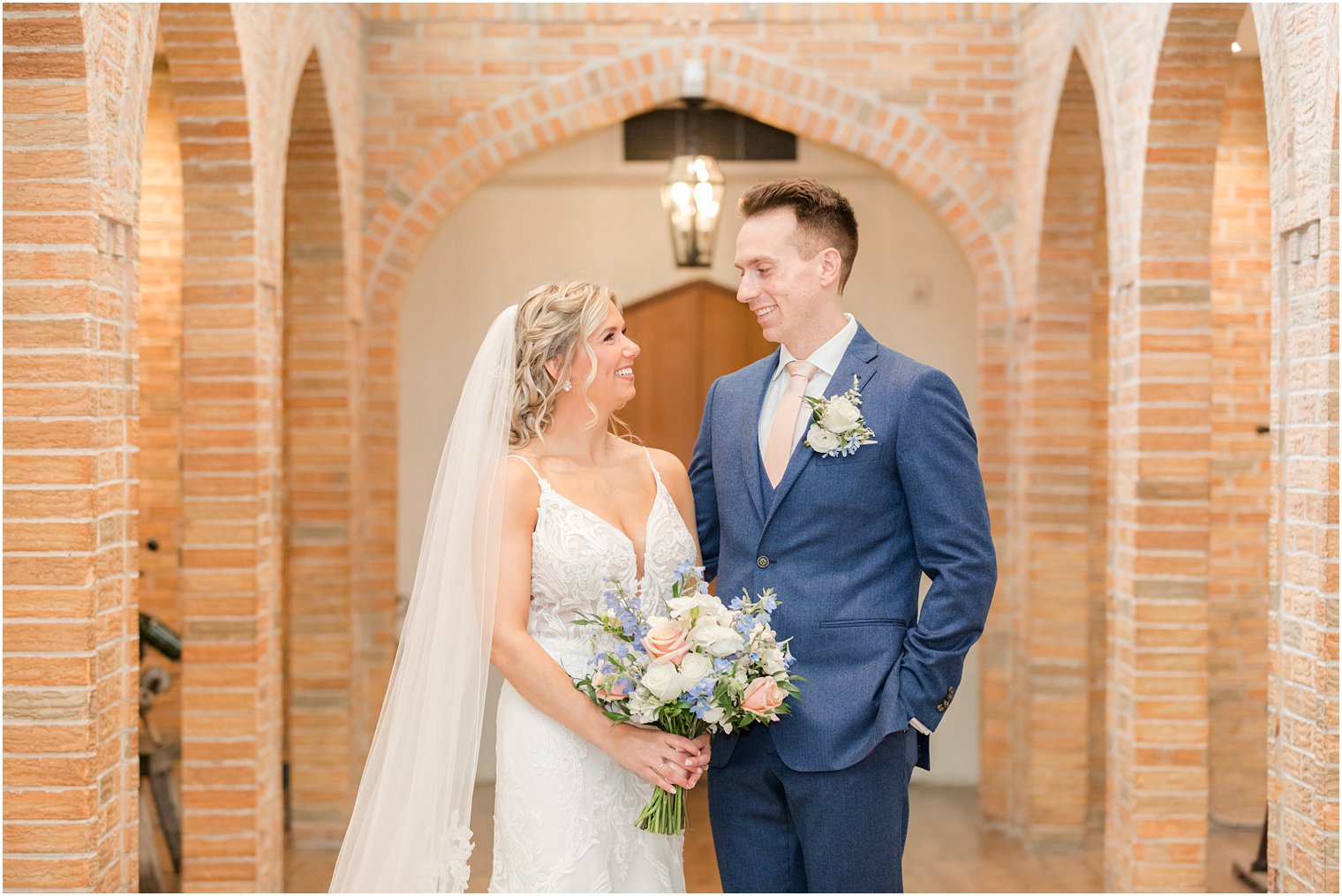 photos of bride and groom smiling at each other at Renault Winery in Egg Harbor Township, NJ