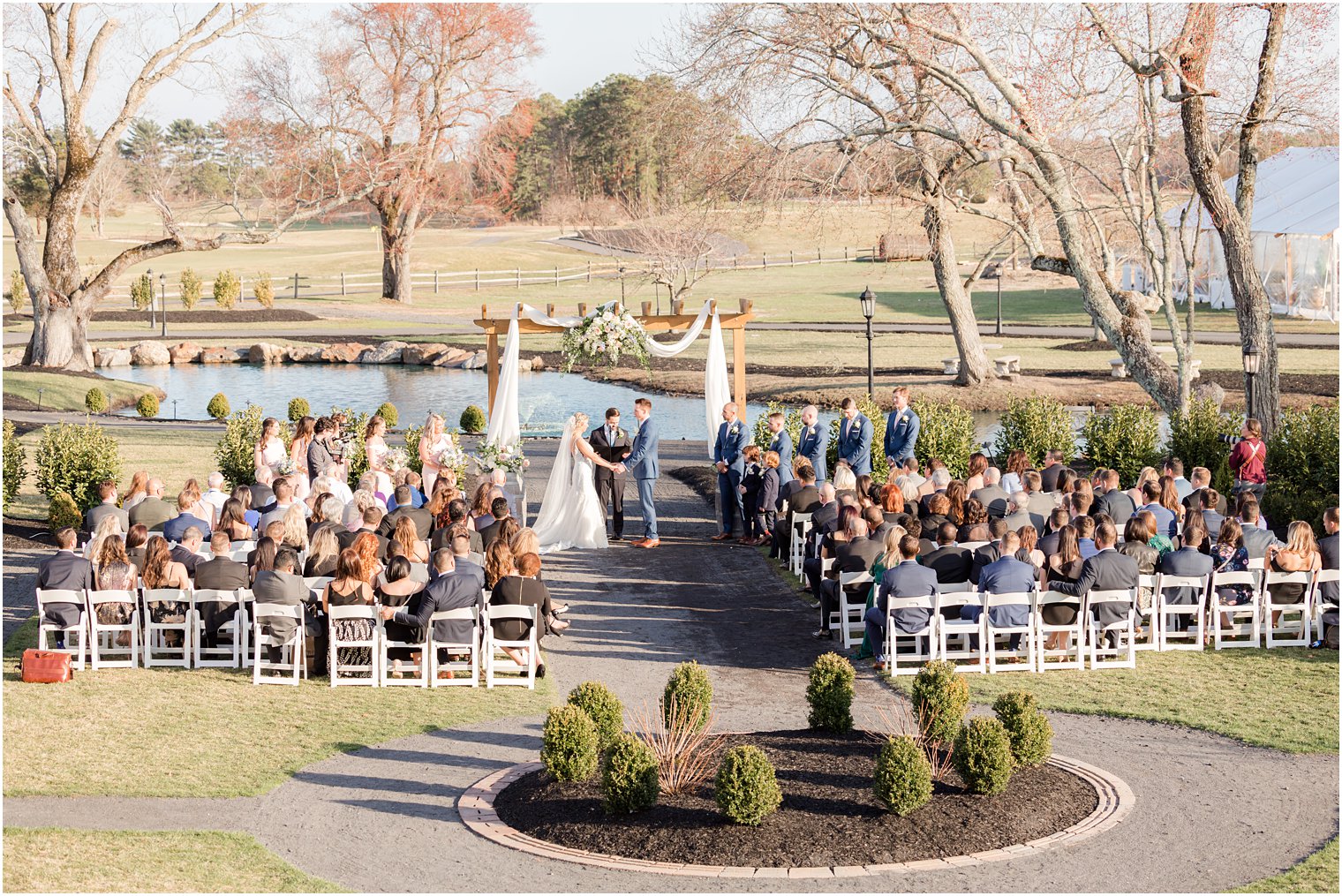 bride and groom during outdoor ceremony at Renault Winery in Egg Harbor Township, NJ