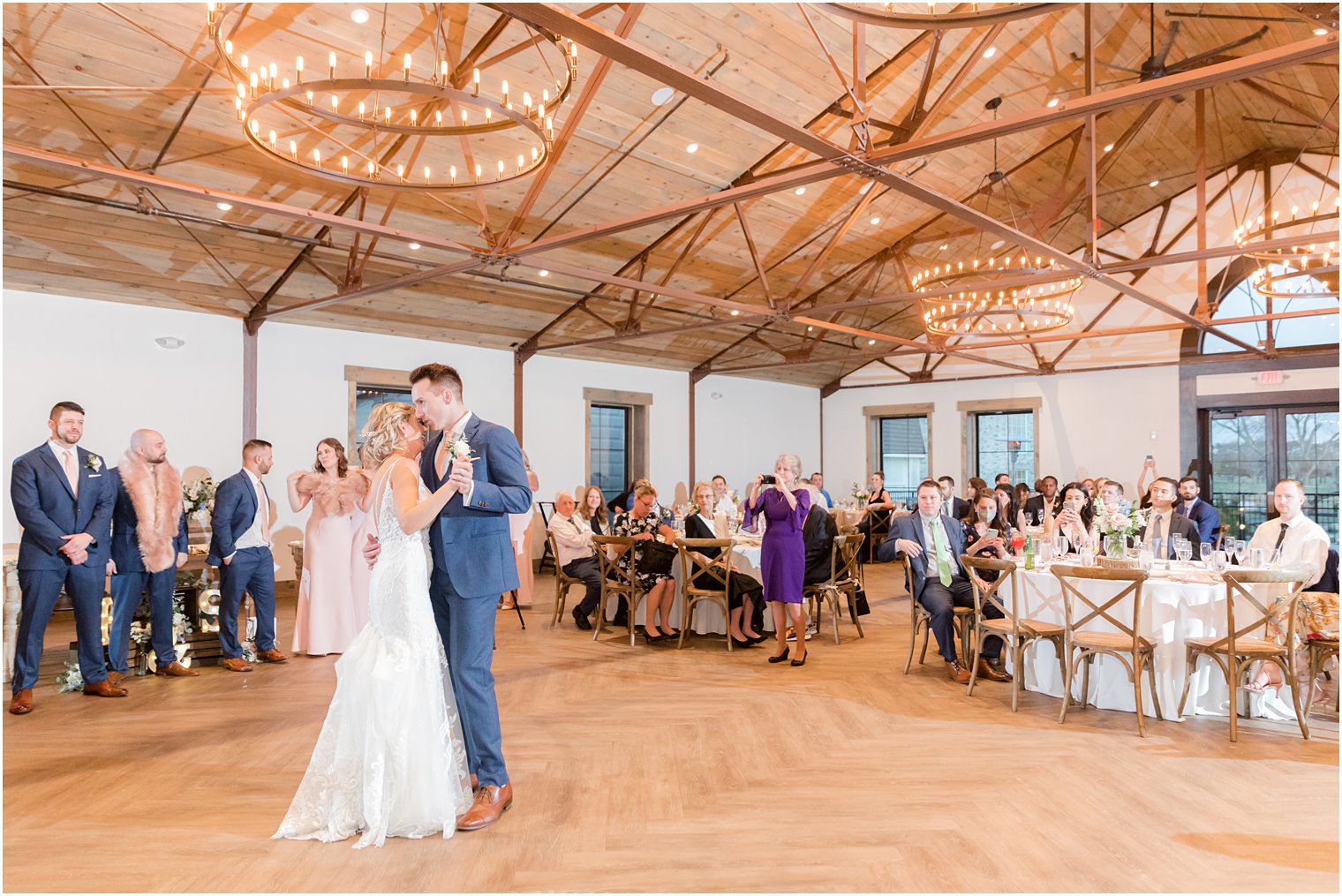 bride and groom dancing during rustic wedding reception in Vineyard Ballroom at Renault Winery South Jersey Venue in Egg Harbor Township NJ