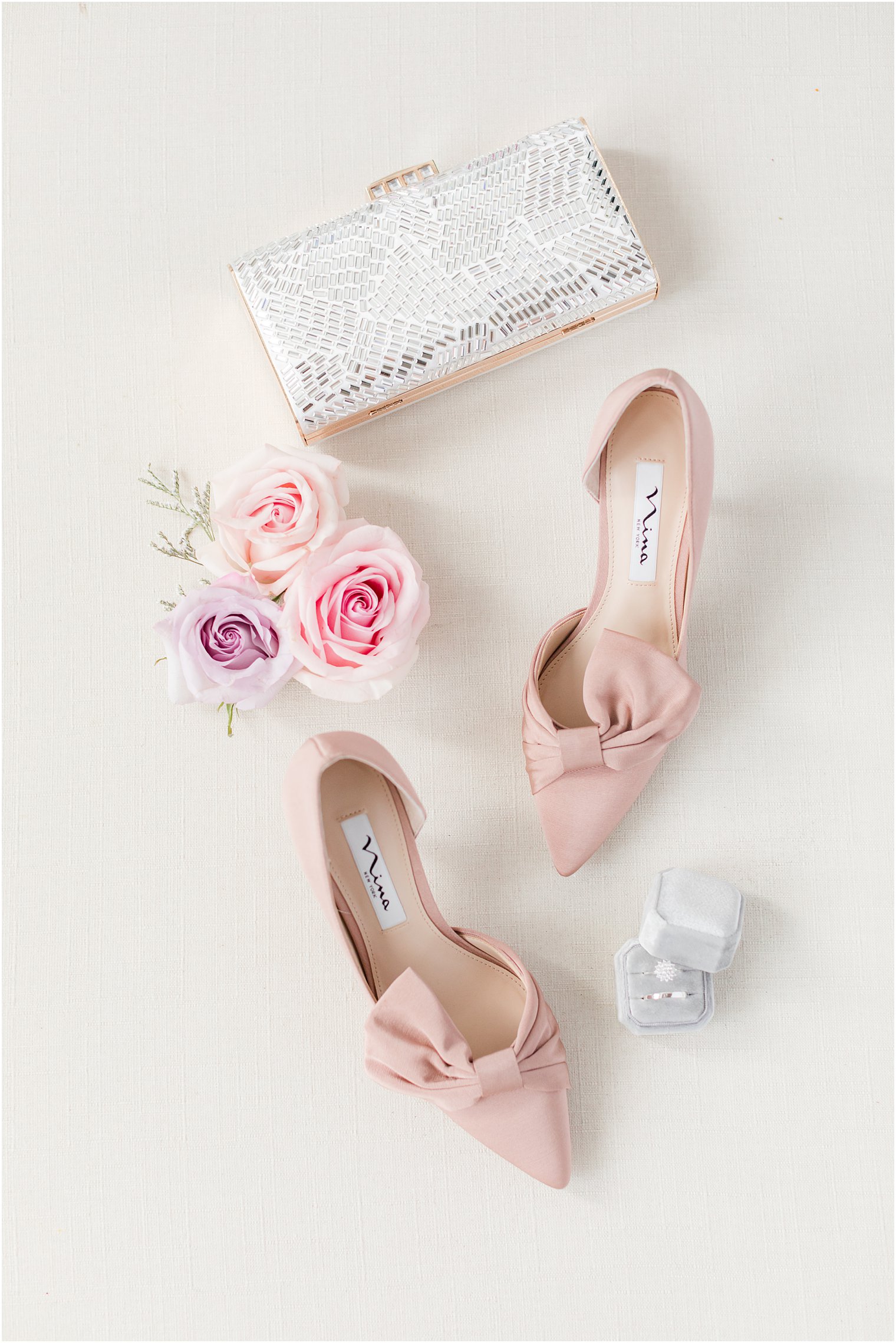 pastel pink shoes for bride and clutch 