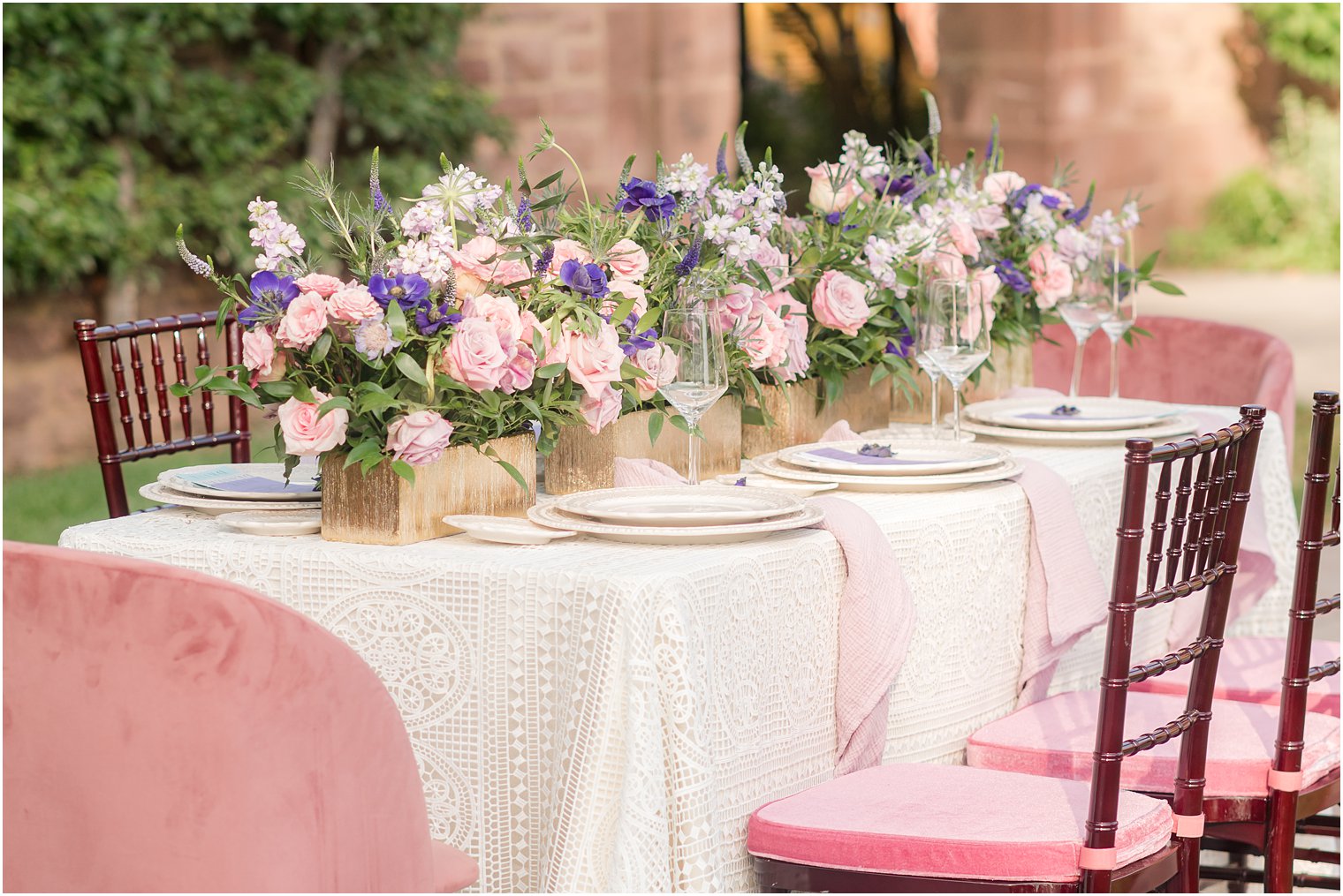 wedding reception for wedding minimony at Tyler Gardens with pastel pink and purple flowers 