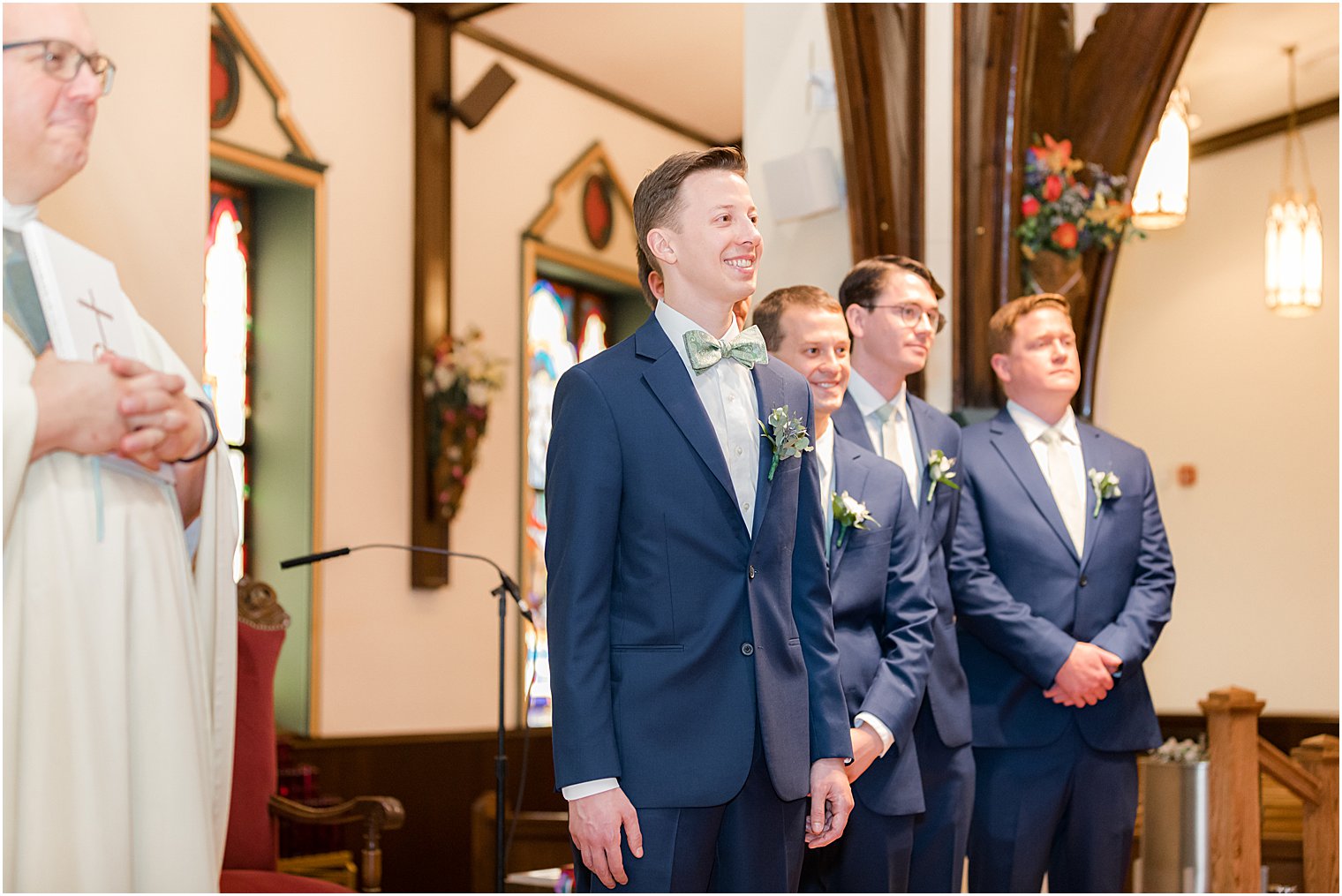 groom watches bride walk down aisle at Avon-by-the-Sea