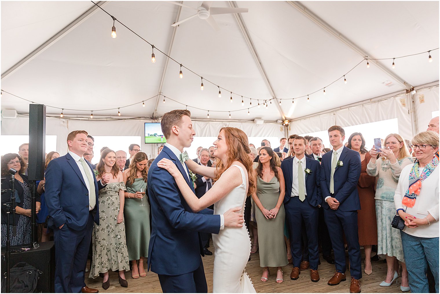 bride and groom have first dance during Belmar Fishing Club wedding day