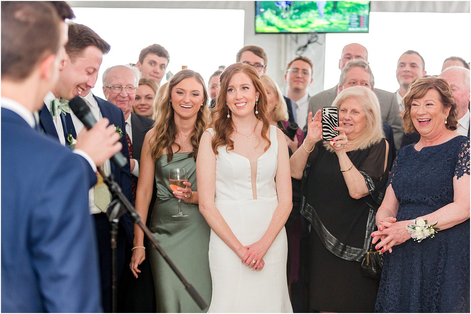 bride stands with mom during dances