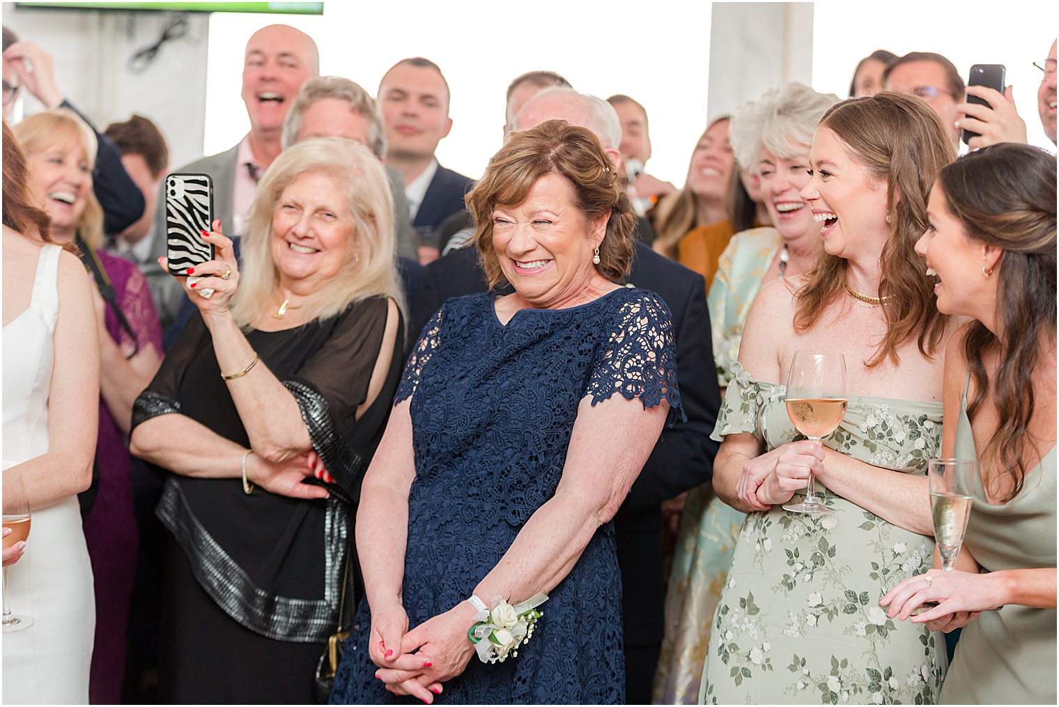 groom's mom smiles during NJ wedding reception