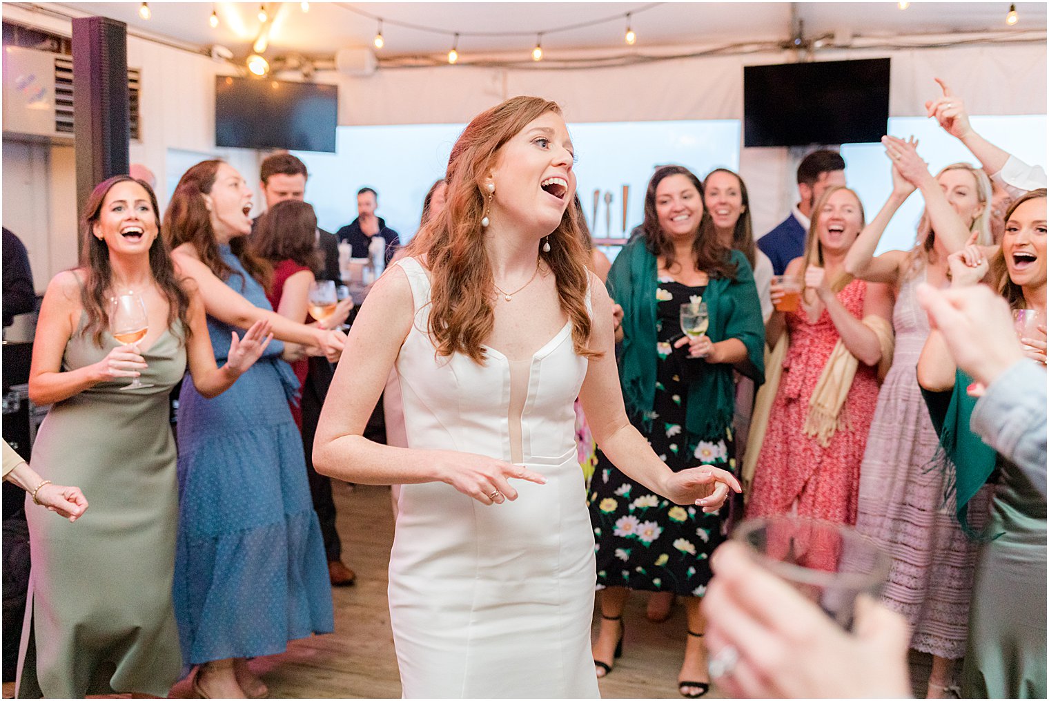 bride dances with guests at Belmar NJ wedding reception