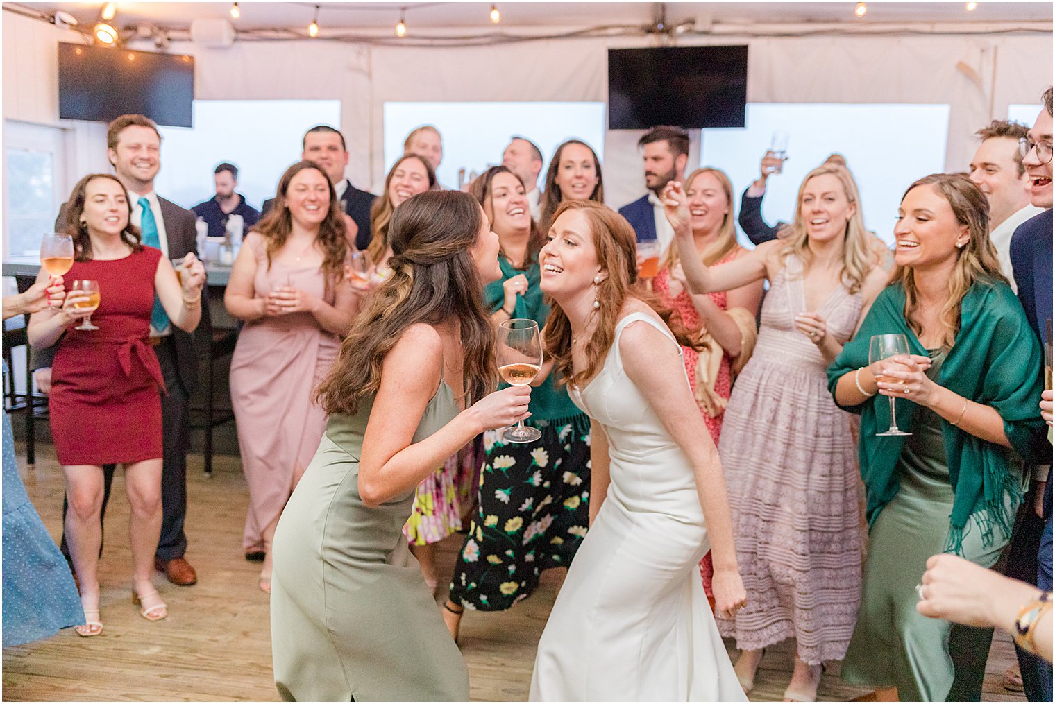 bride dances with guests at Belmar NJ wedding reception