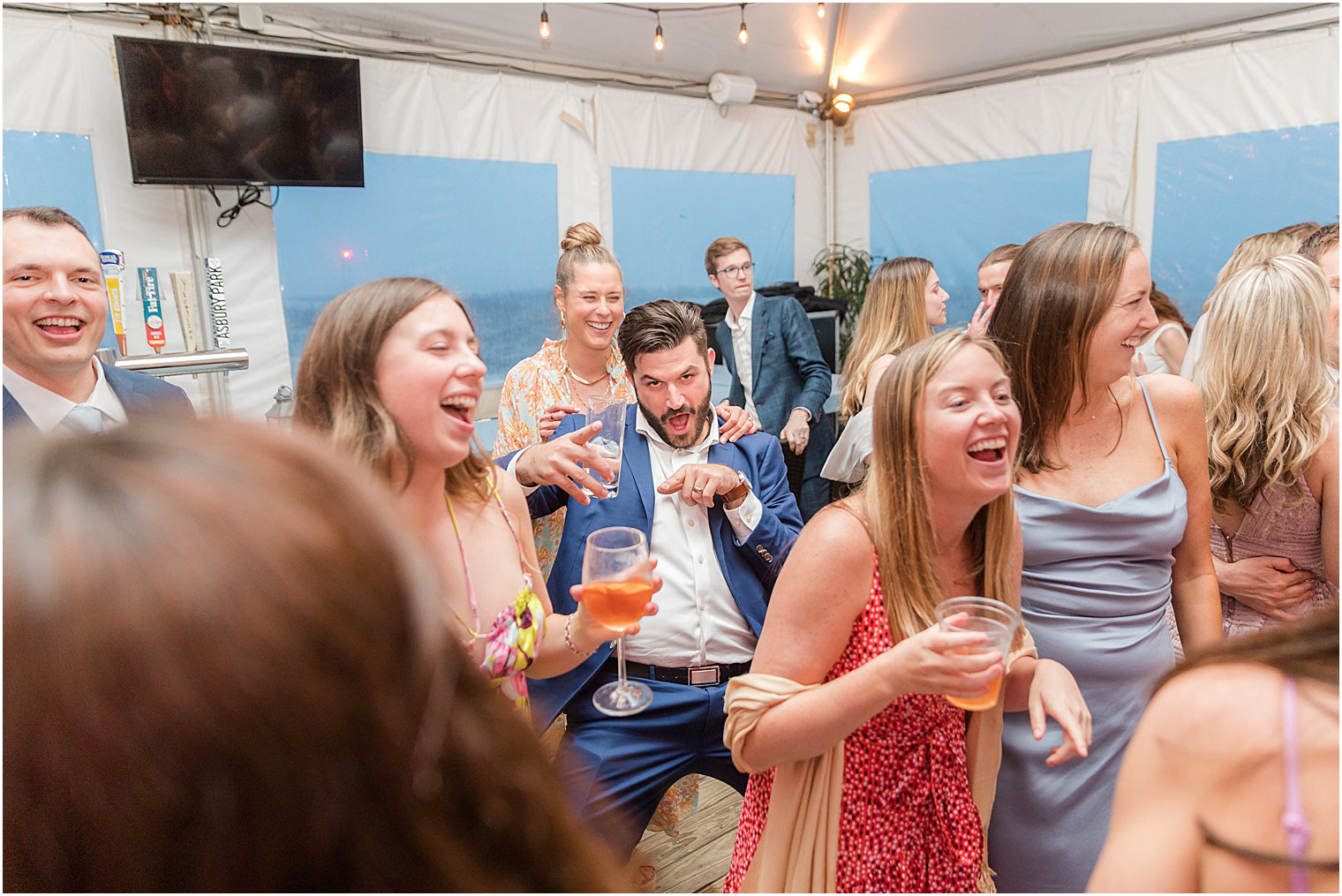 groomsman dances during NJ reception