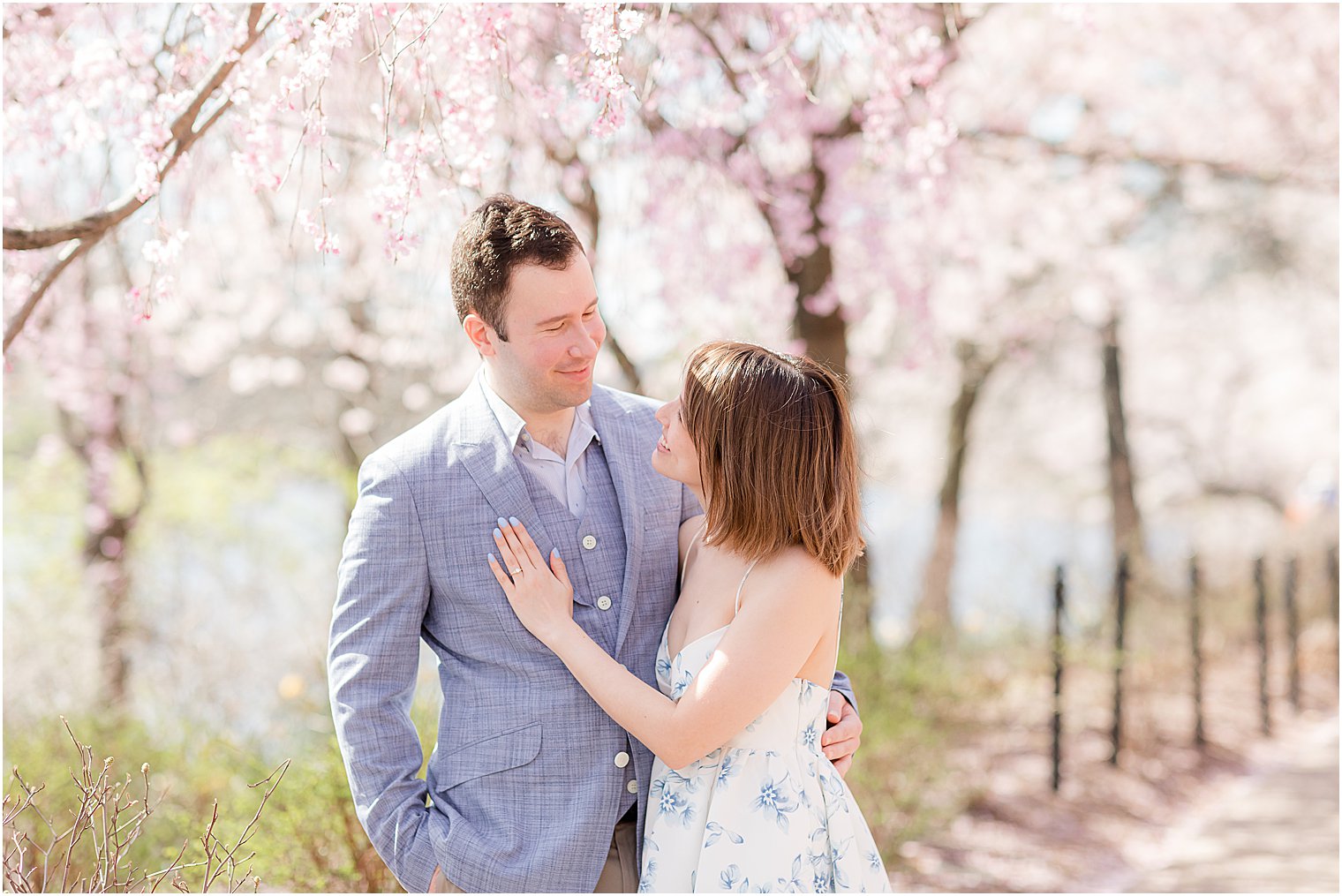 engaged couple hugs during spring engagement photos