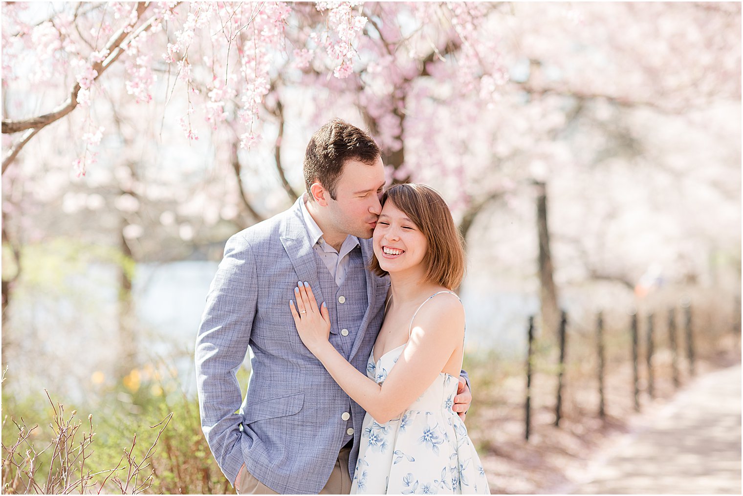 bride hugs groom during Branch Brook Park engagement session