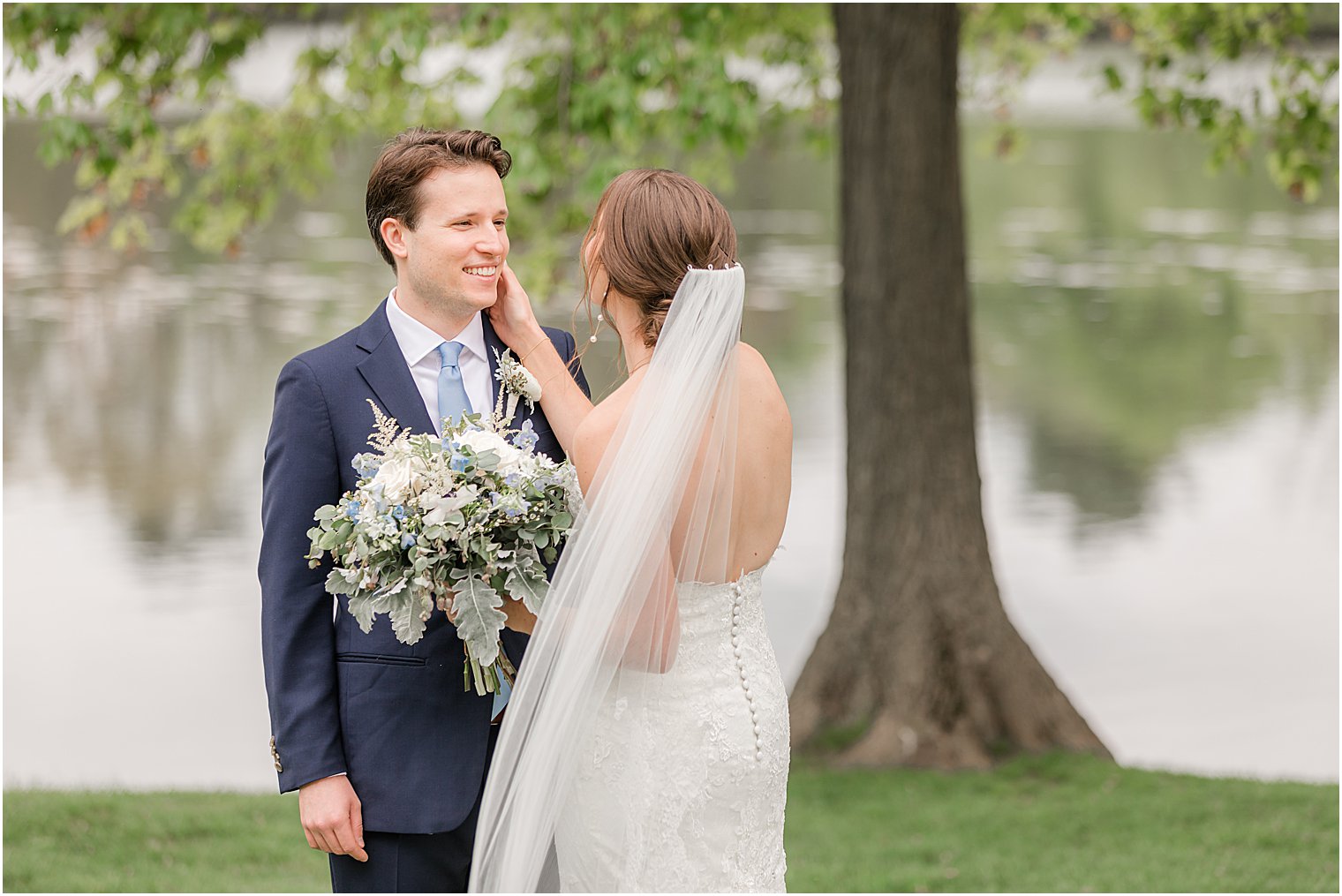 bride wipes away groom's tears