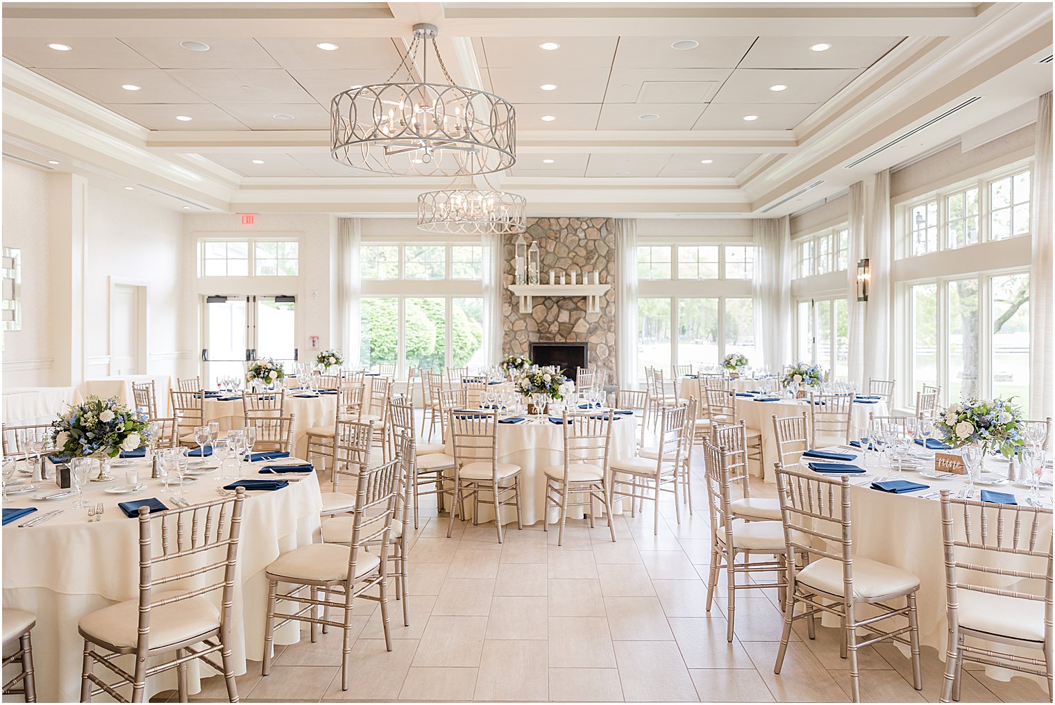 wedding reception setup with blue and white details at Indian Trail Club 