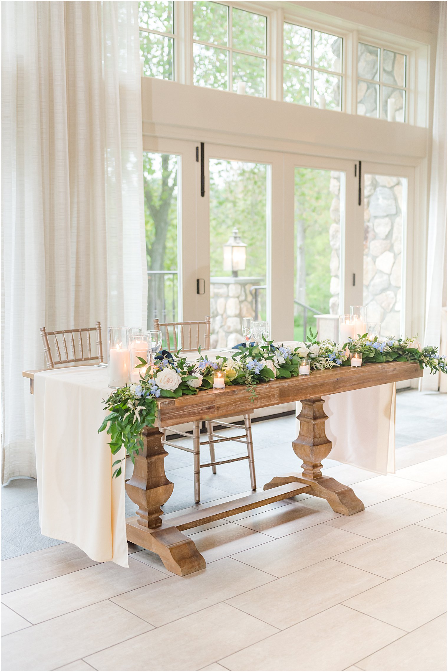 sweetheart table with greenery runner