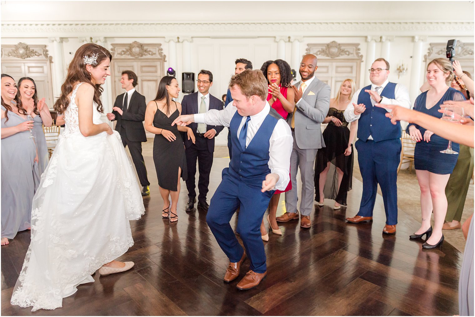 groom and bride dance with guests during East Brunswick NJ wedding reception