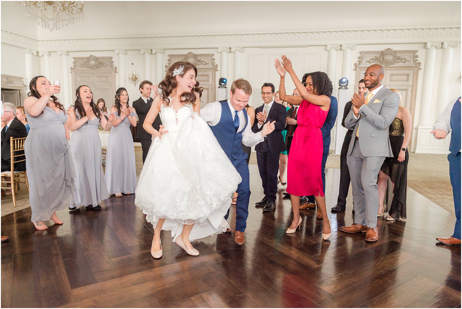 bride dances with guests during East Brunswick NJ wedding reception