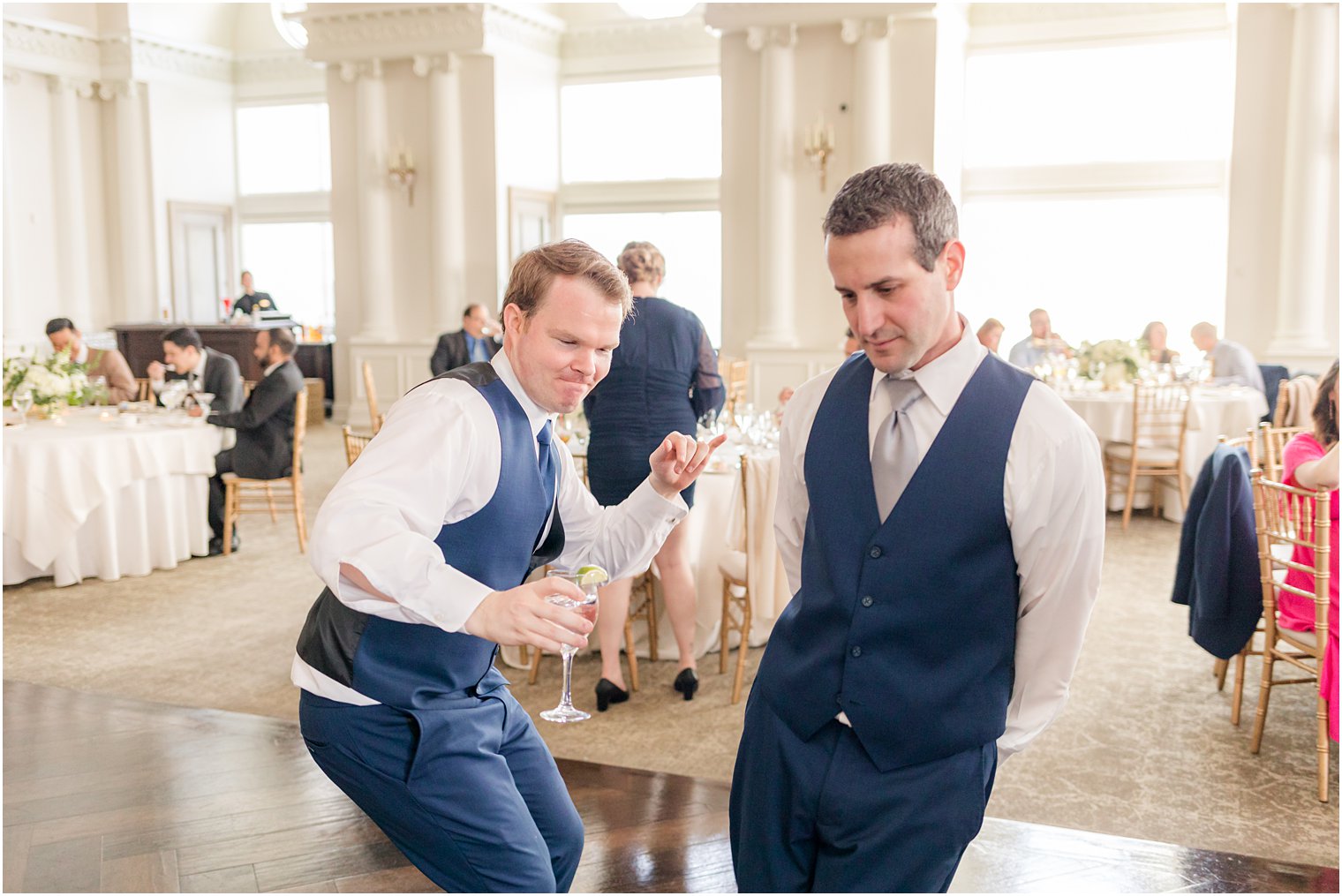 groom dances with groomsman 