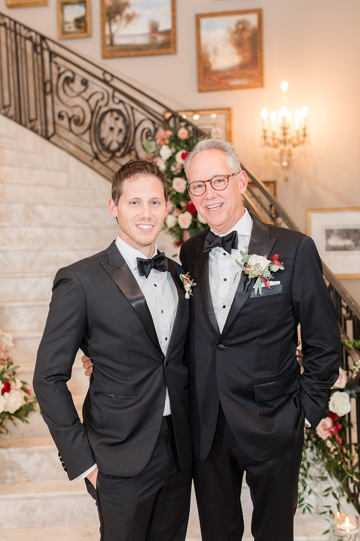 father and son during family formals at wedding day