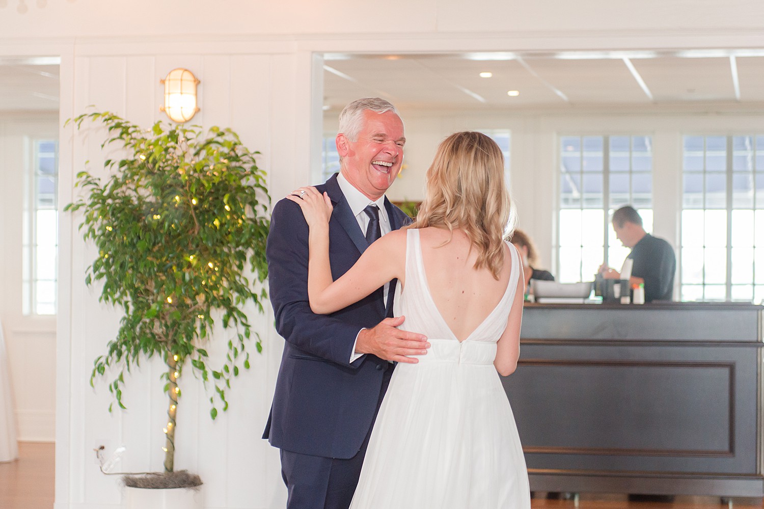 bride and father dance together at reception | Tips to include dad in wedding day!
