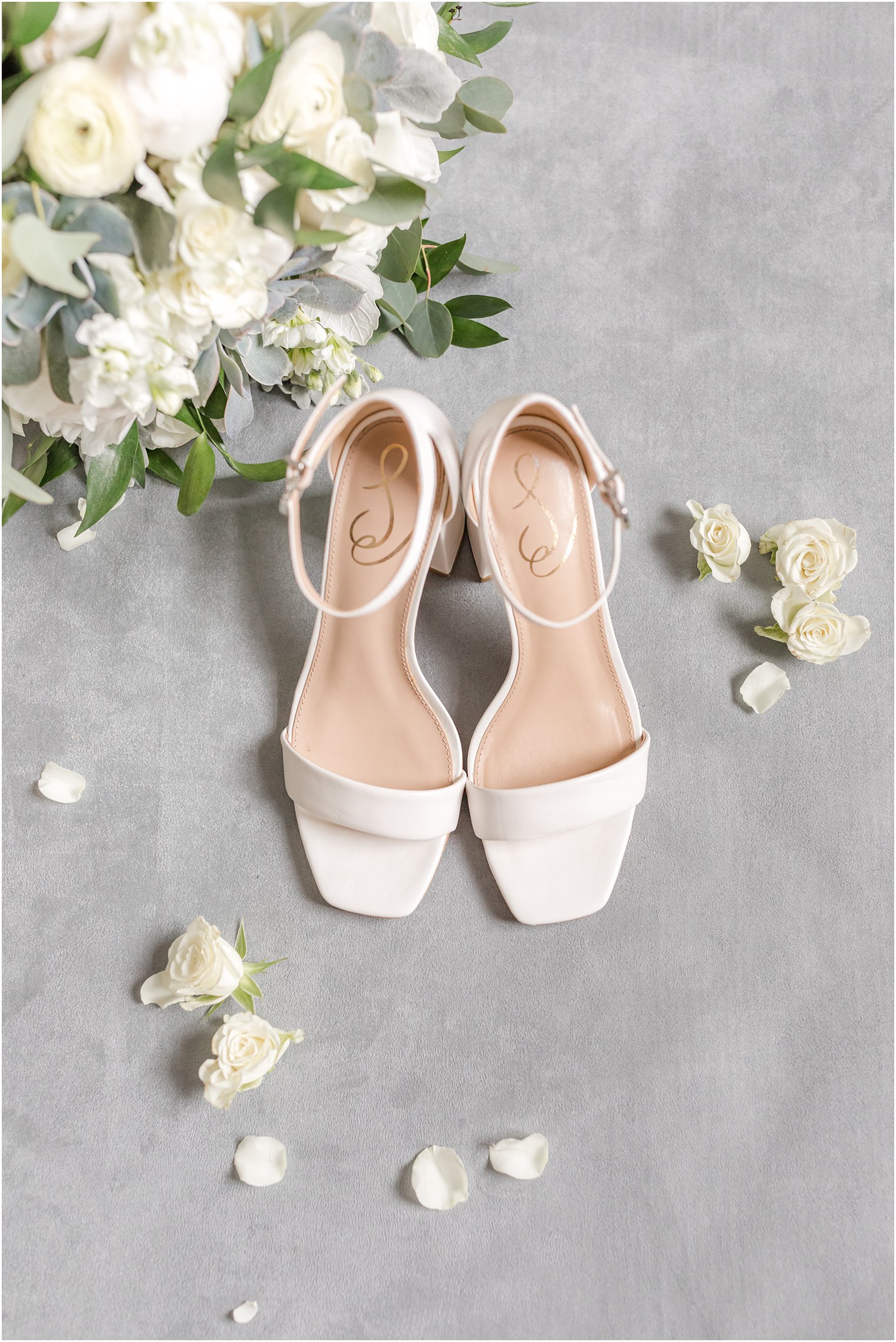 bride's white shoes for summer wedding at Indian Trail Club