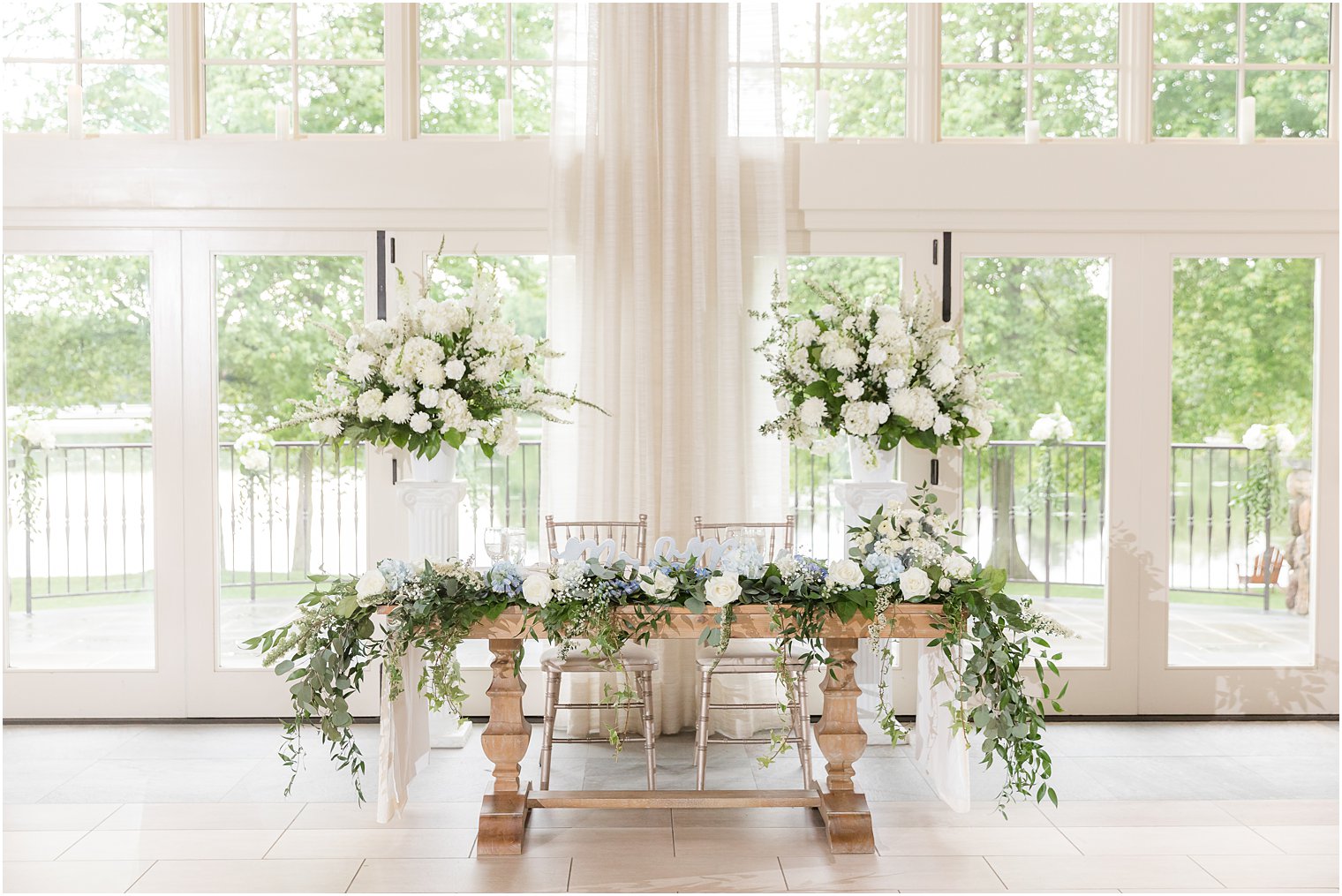 sweetheart table for wedding reception in the summer at Indian Trail Club