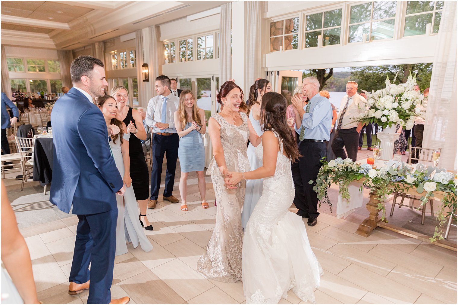 bride and mom dance together during NJ wedding reception