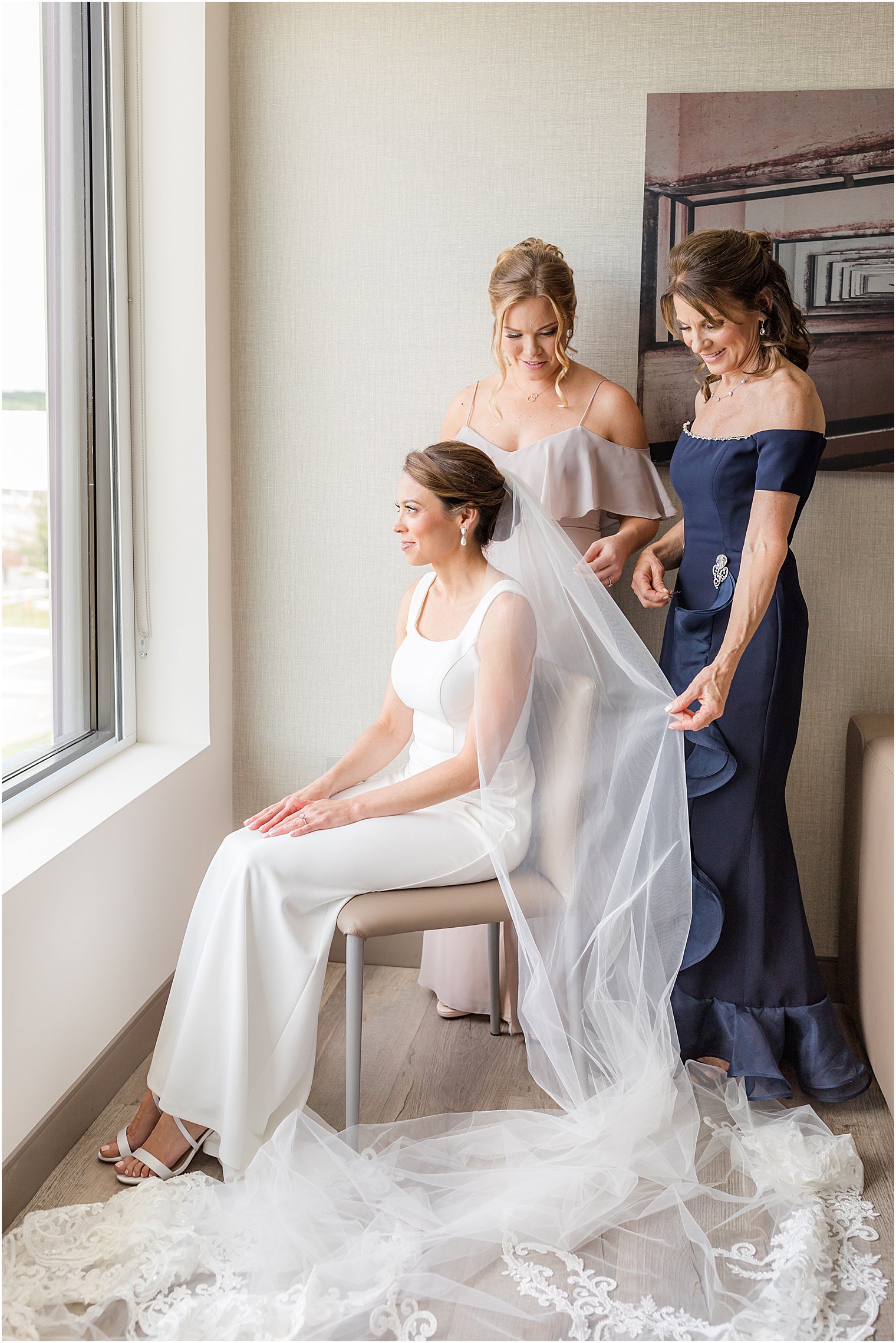 bride, mother, and sister prepare for Ryland Inn wedding