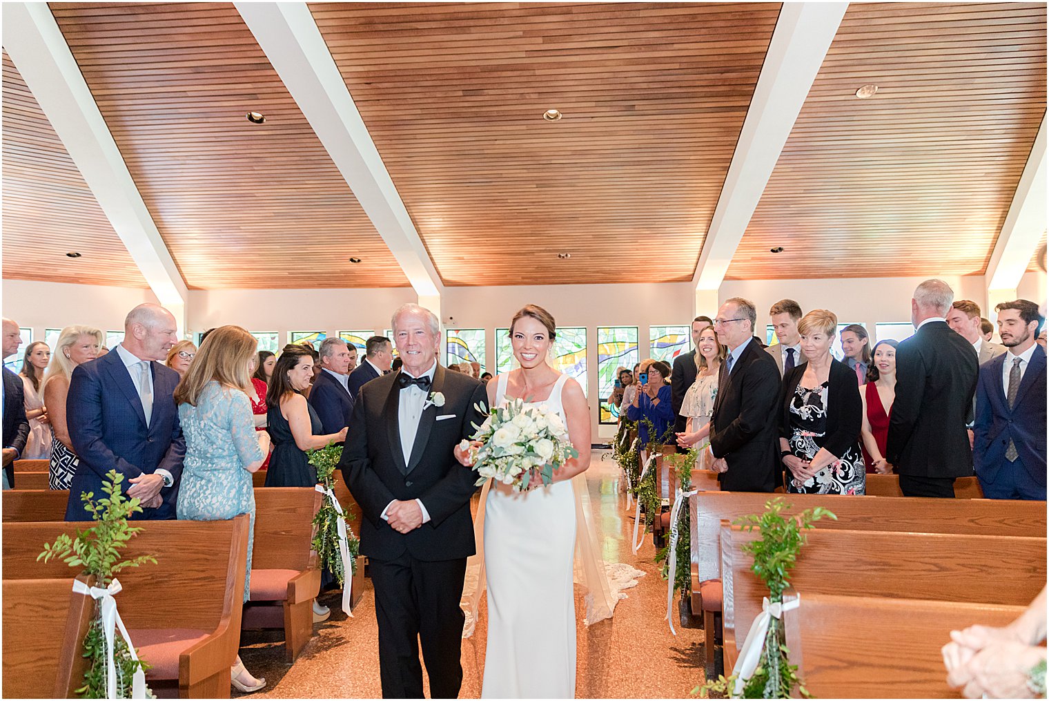 bride enters ceremony at St.Joseph Roman Catholic Church