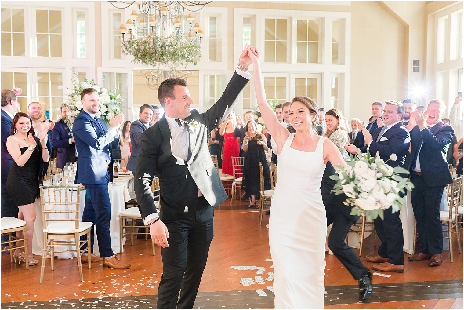 groom twirls bride during dance at Ryland Inn