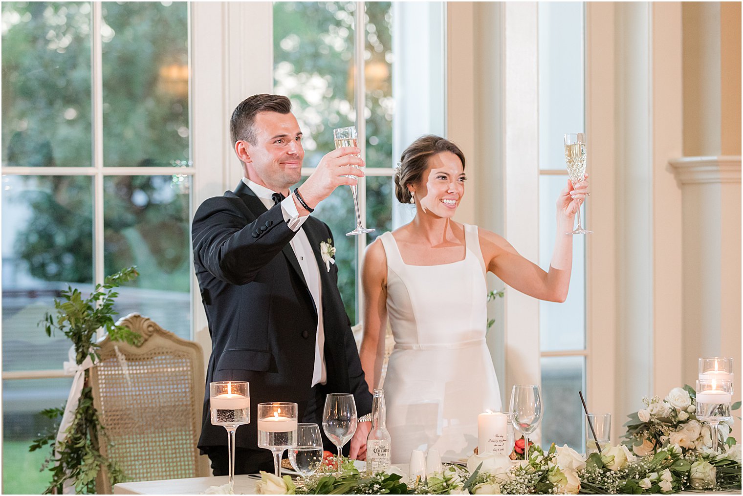 couple toasts during Whitehouse Station NJ wedding reception