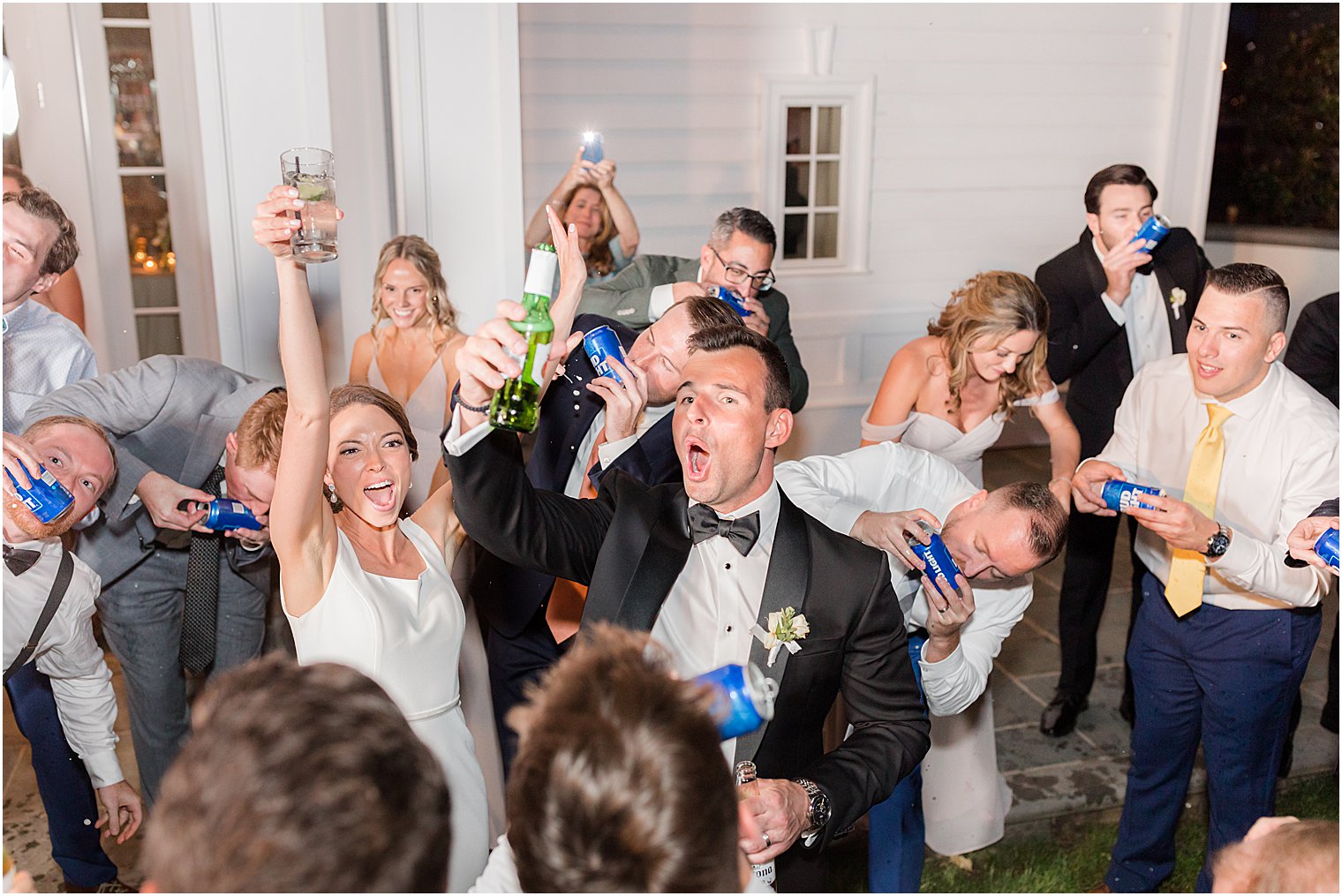 bride and groom dance with guests at Whitehouse Station NJ wedding reception