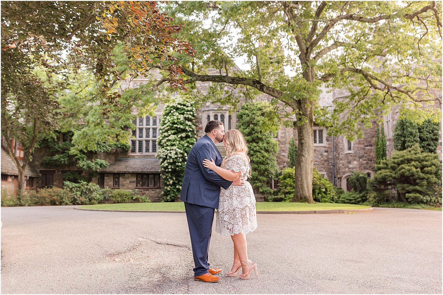 bride and groom kiss by Skylands Manor