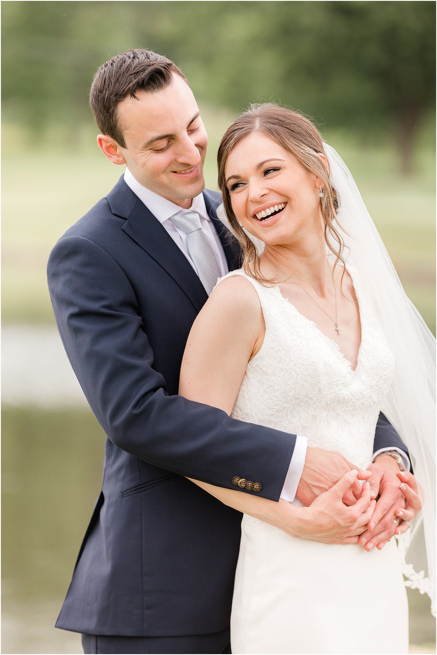 bride and groom laugh during NJ wedding photos at Spring Brook Country Club