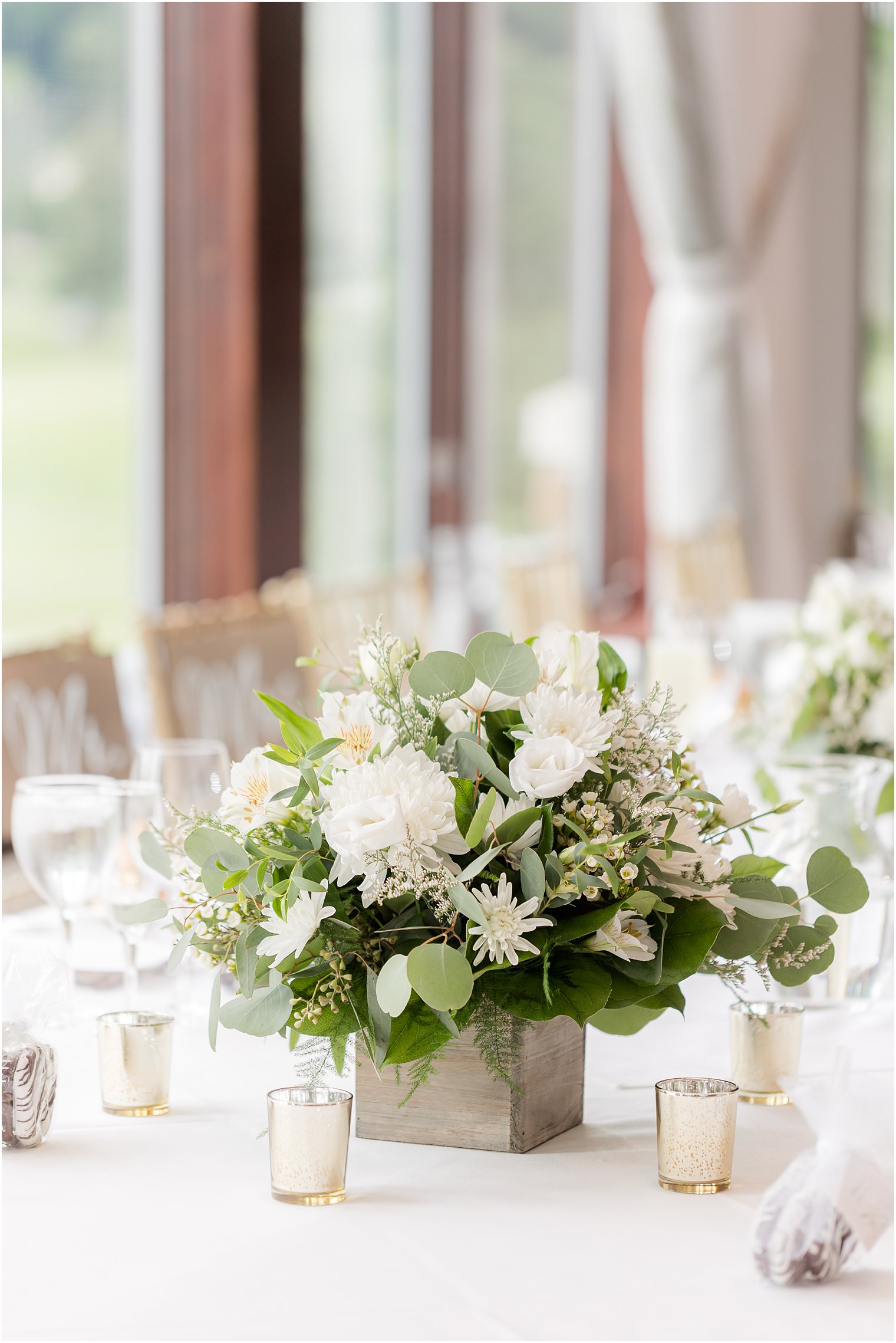 white floral centerpieces at Spring Brook Country Club