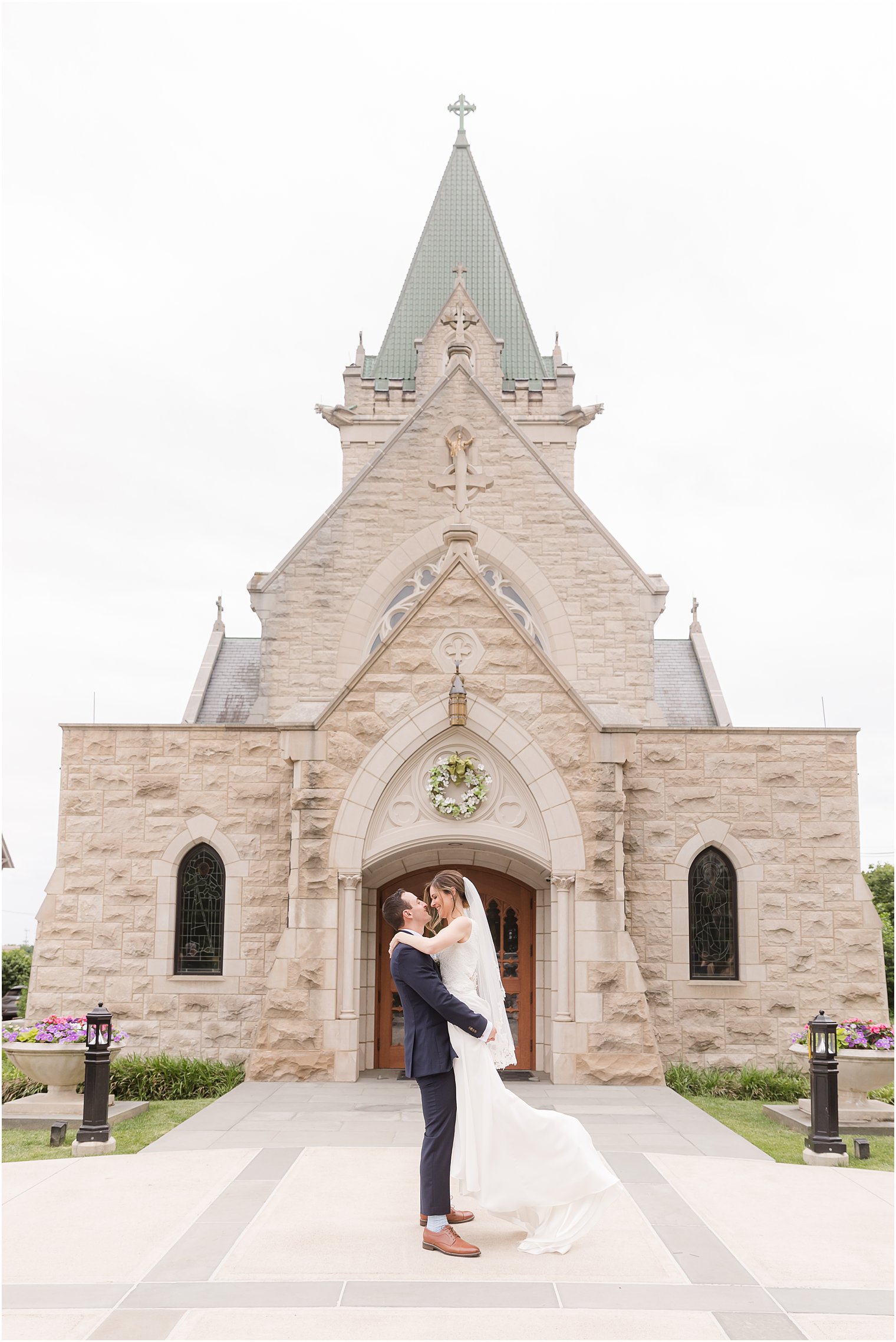 newlyweds pose outside church in New Jersey 