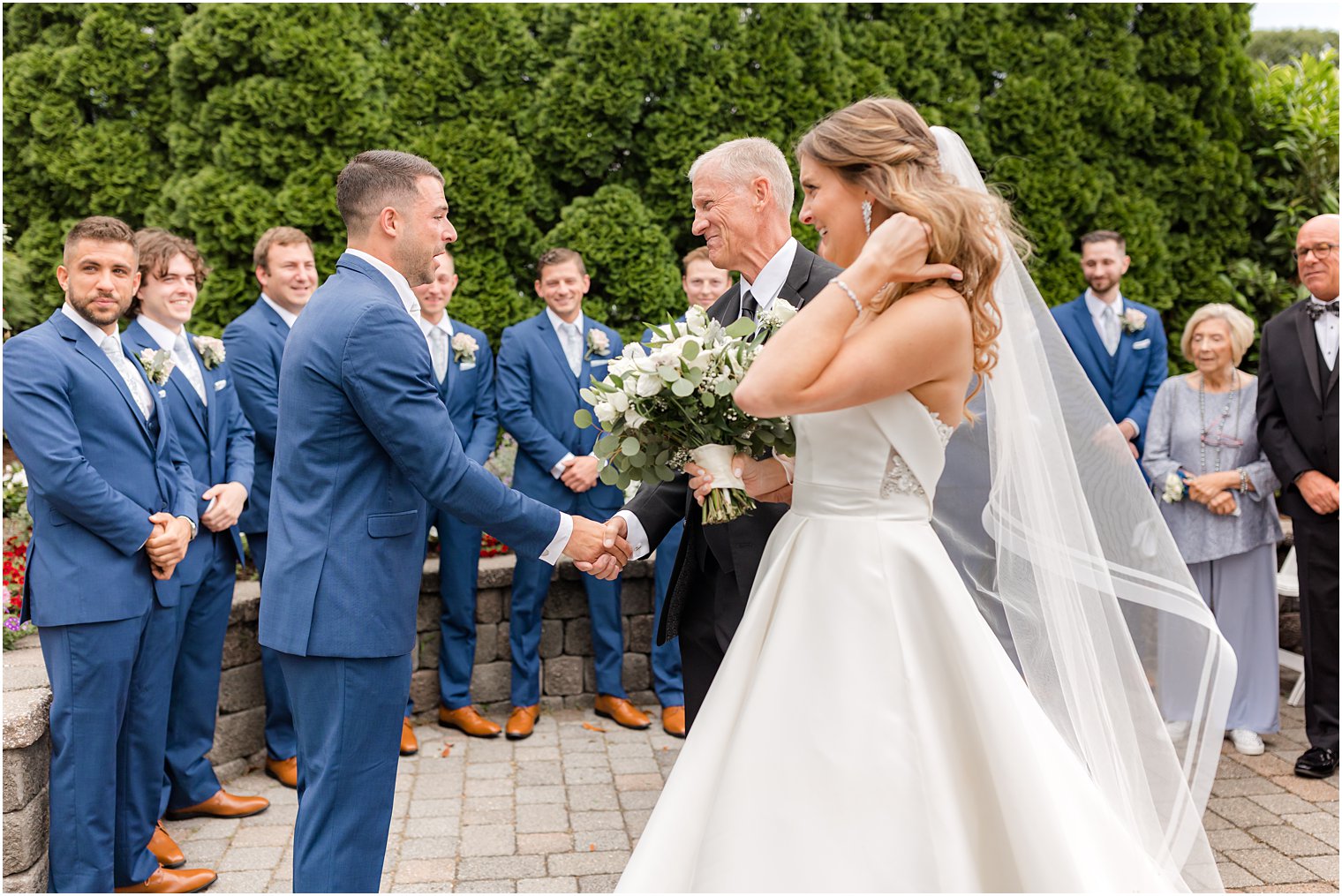 dad gives bride away during Spring Lake NJ wedding ceremony