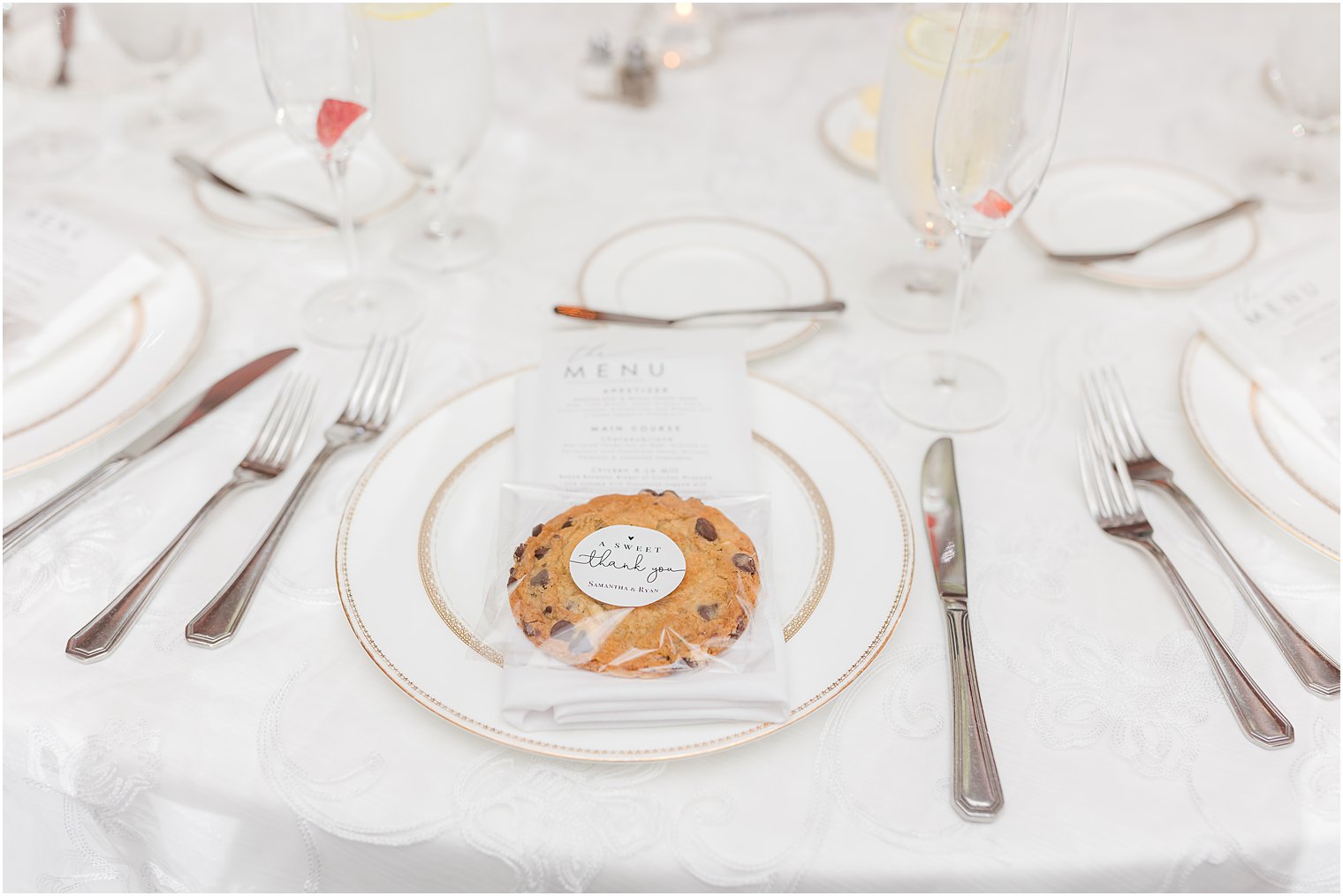place settings with cookies at The Mill Lakeside Manor