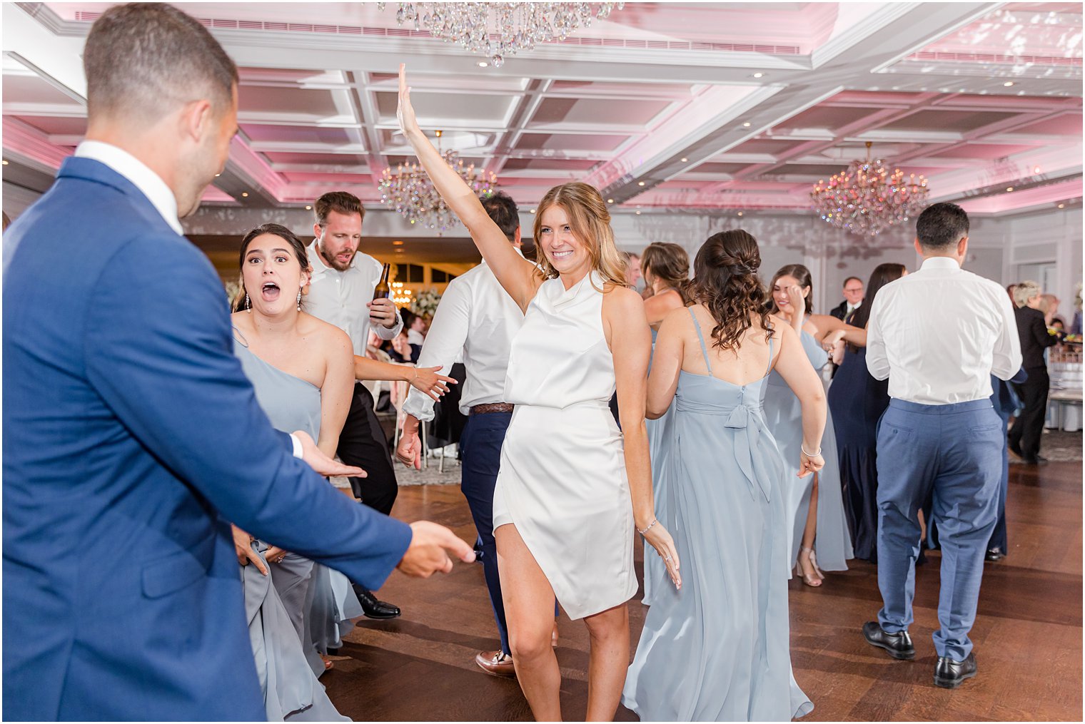 bride shows off second dress for wedding reception in New Jersey