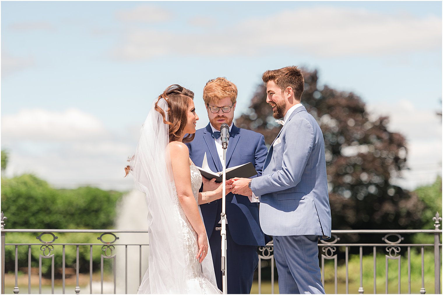 newlyweds exchange vows during ceremony at Park Chateau Estate