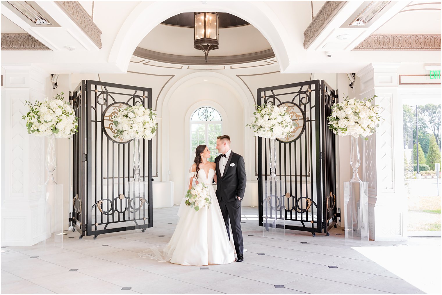 bride and groom stand inside chapel at Shadowbrook at Shrewbsury