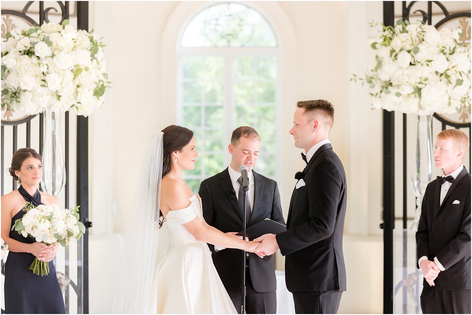 bride and groom exchange vows in Shadowbrook at Shrewbsury chapel