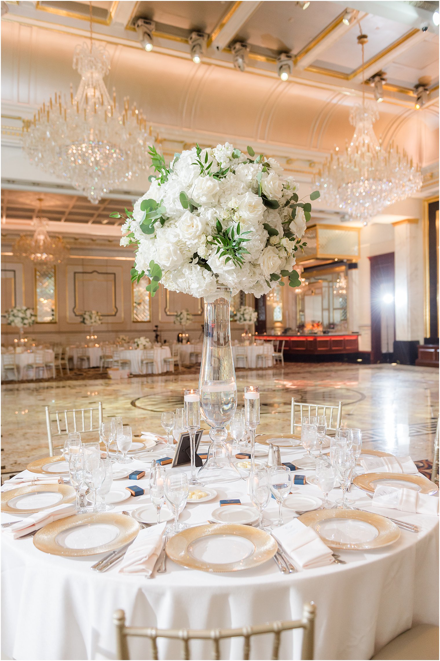tall white floral centerpieces at Shadowbrook at Shrewbsury