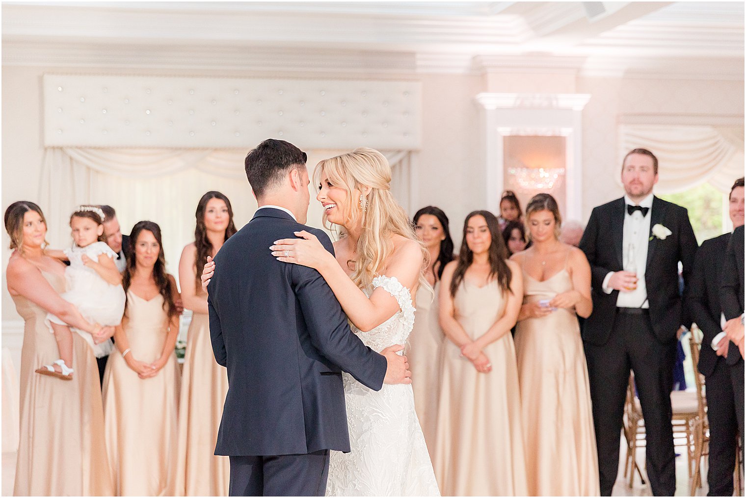 newlyweds dance together during The English Manor wedding reception 