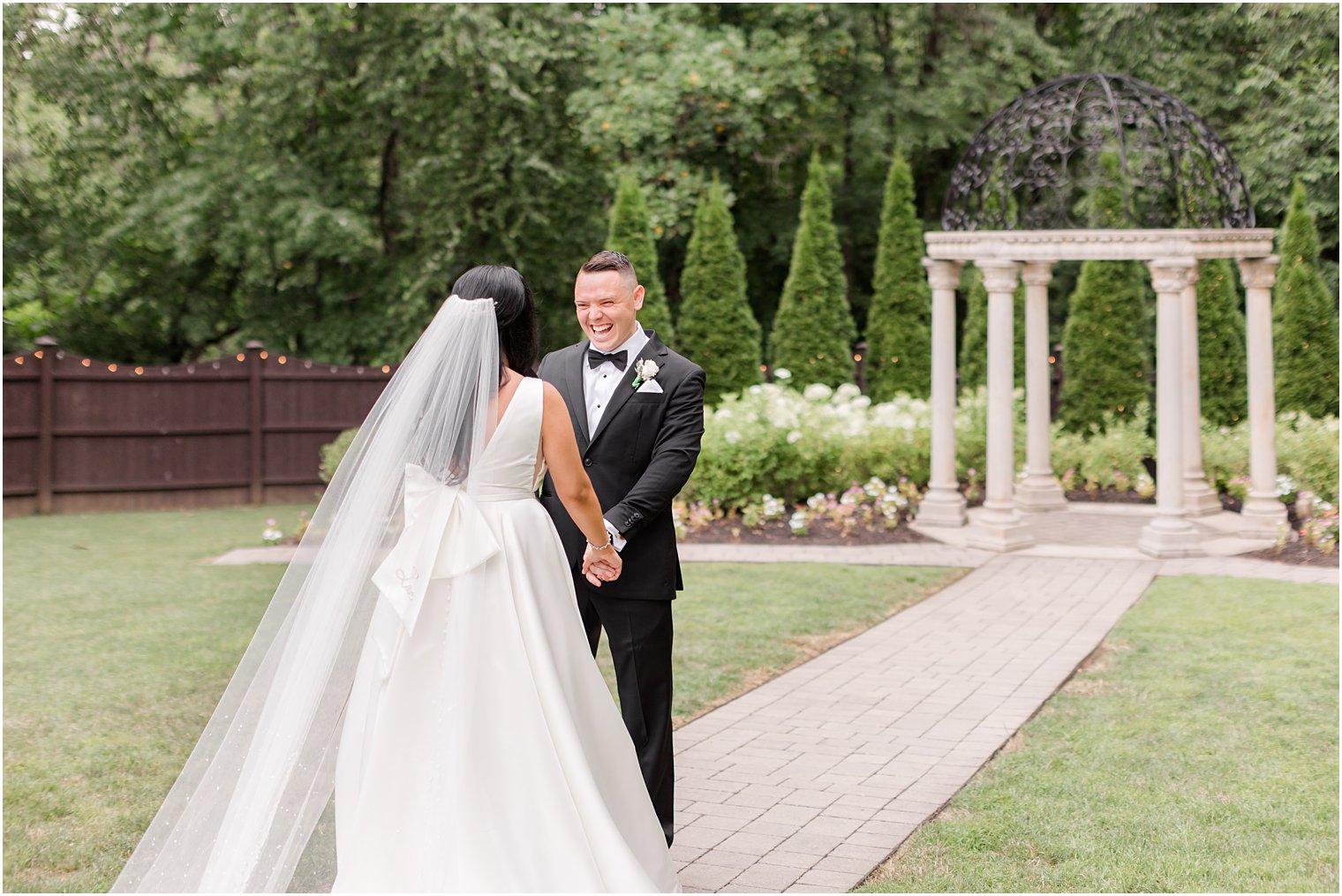 groom reacts to seeing bride during first look at Hamilton Manor